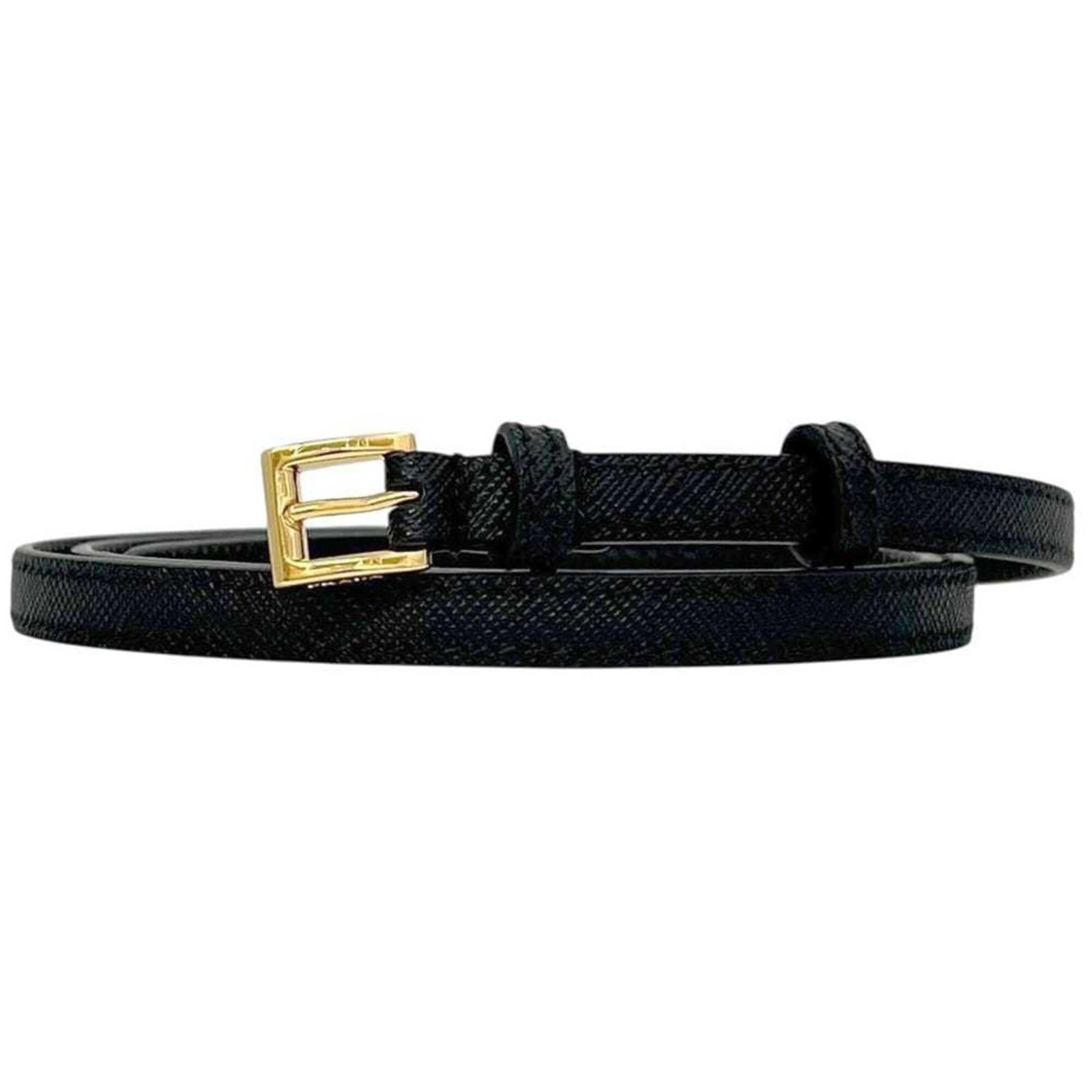 Standard Belt by Prada: Standard Belt by Prada Standard Belt by Prada, crafted from high-quality black leather, features a timeless design with a length range of 70cm-80cm. This classic belt is made to last, with its sleek