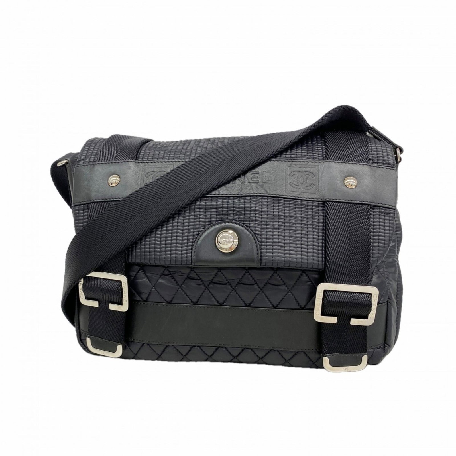 Shoulder Bag Nylon by Chanel: Shoulder Bag Nylon by Chanel Black Nylon shoulder bag by Chanel, featuring silver hardware and measuring 25cm x 32cm x 7cm. This stylish and functional bag is made from high-quality nylon material, pe