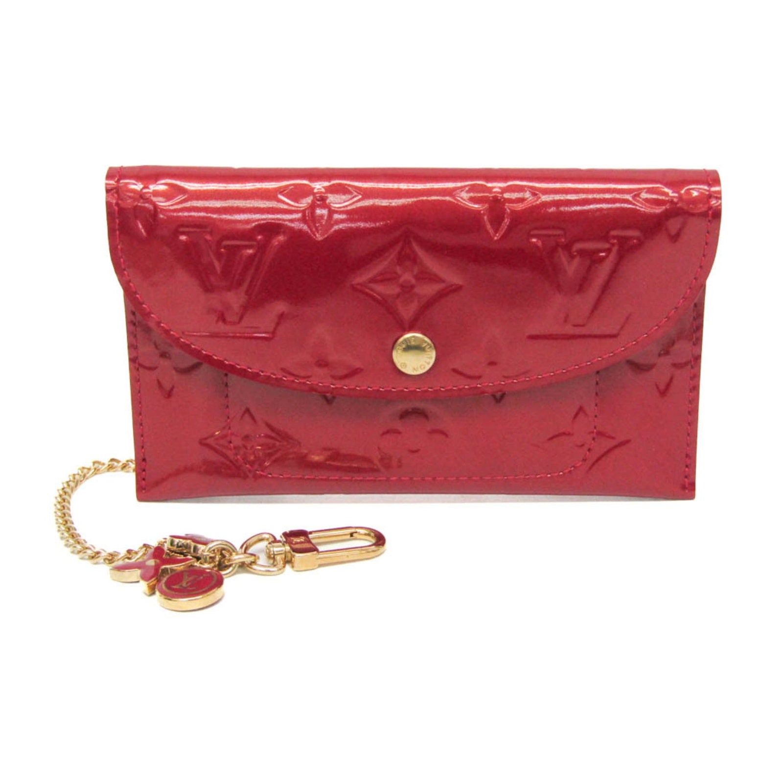 Vernis Monogram Purse Coin Case Louis: Vernis Monogram Purse Coin Case Louis Monogram Vernis Coin Case Louis by Louis Vuitton boasts a sophisticated design with a rich, luxurious feel. The iconic Monogram Vernis pattern adds a touch of