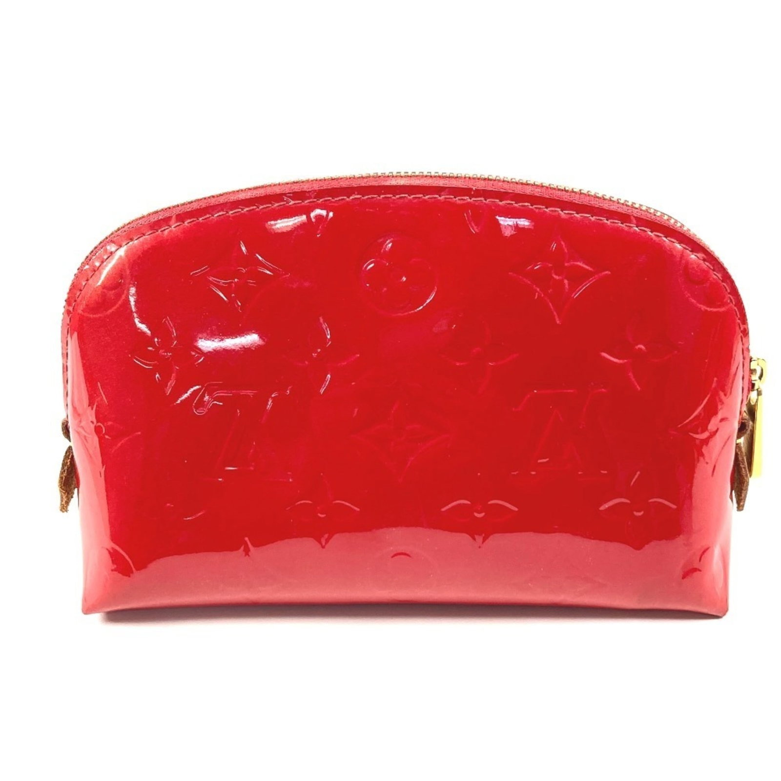 Vernis Monogram Pouch Vuitton Louis: Vernis Monogram Pouch Vuitton Louis Monogram Vernis Pouch by Louis Vuitton features a distinctive Cerise red color and the iconic Monogram pattern in Vernis finish. This compact pouch measures 10.5cm