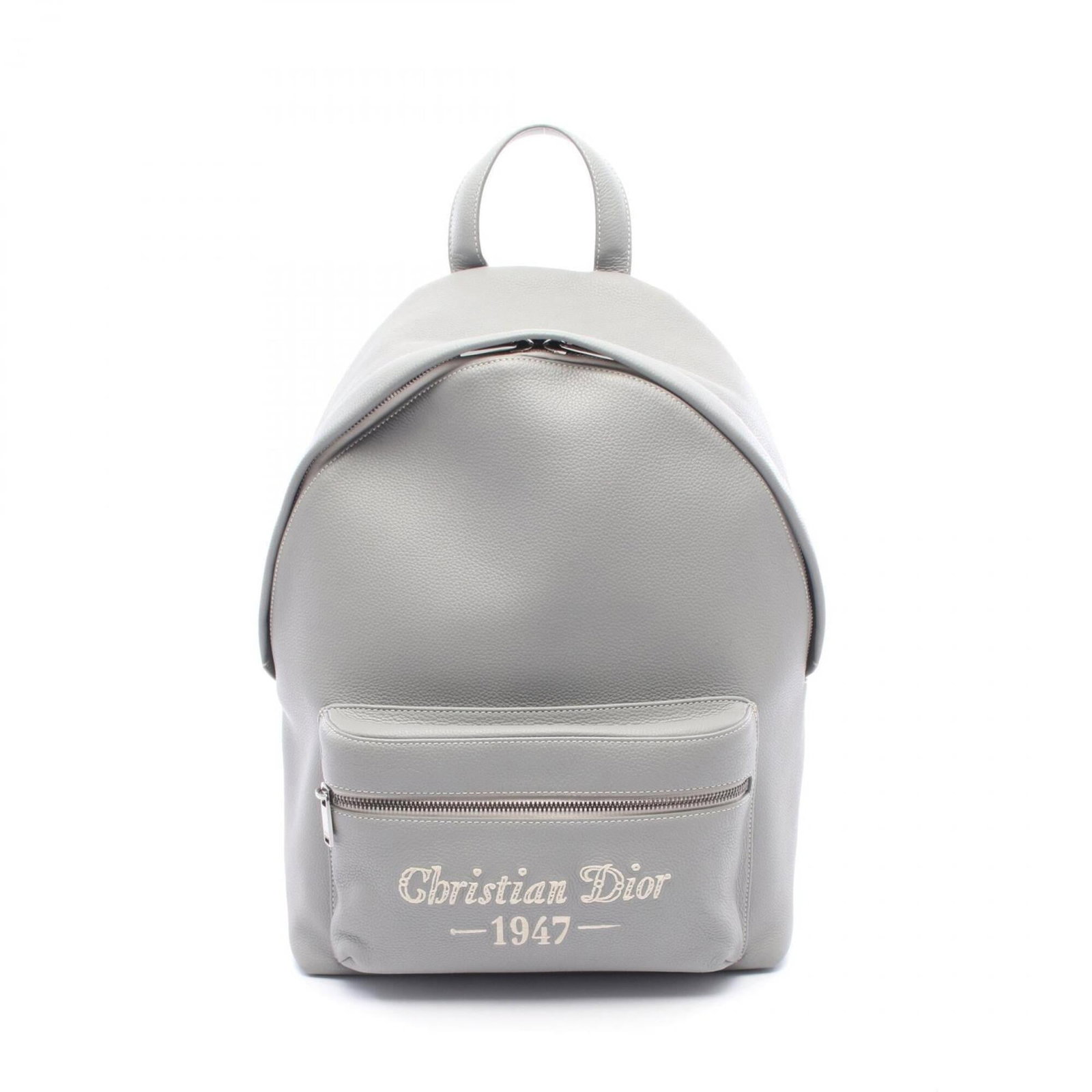 Christian Dior Leather Backpack: Christian Dior Leather Backpack The Christian Dior Leather Backpack boasts sleek, sophisticated design with its high-quality leather exterior in a timeless gray hue. Measuring 35cm x 30cm x 15cm, it