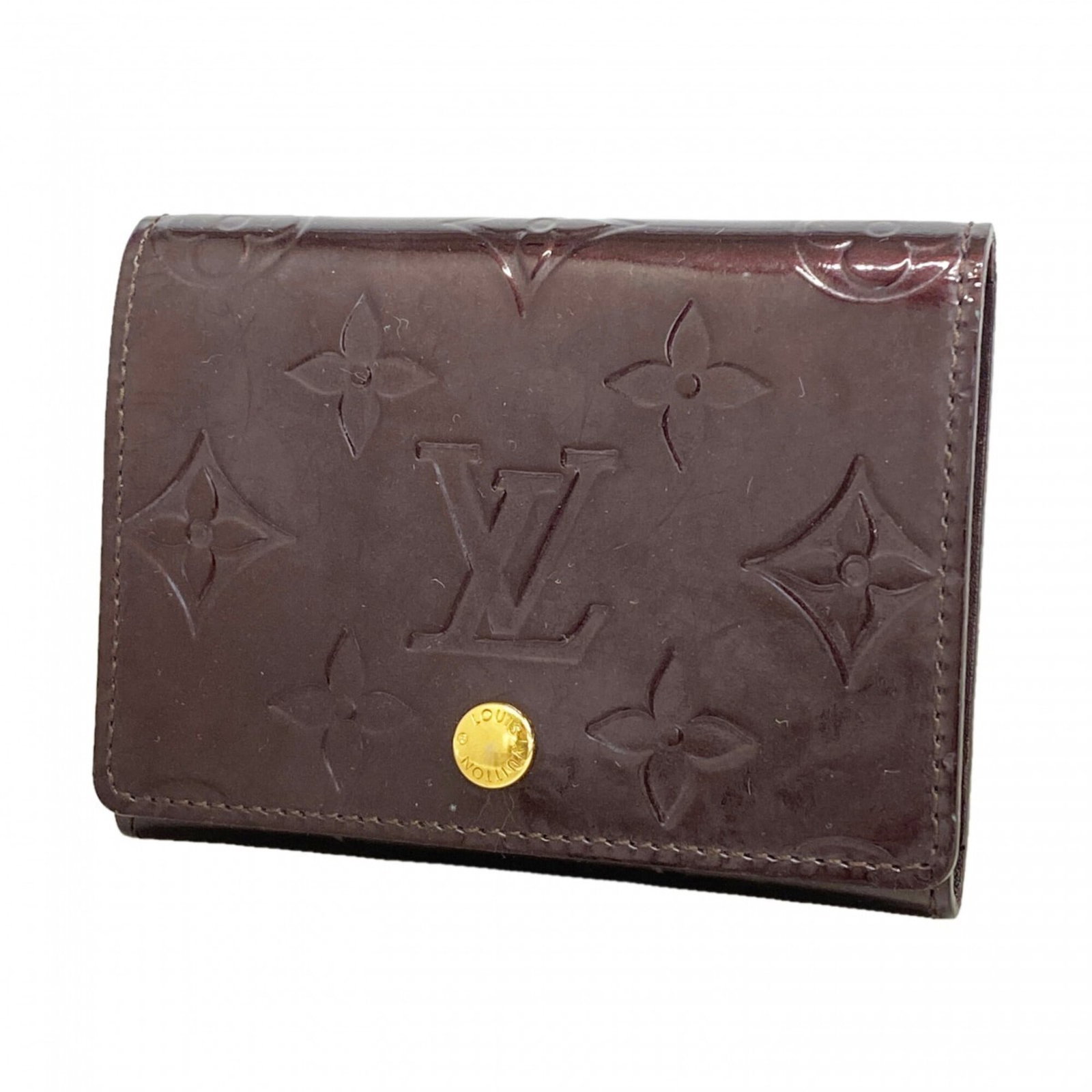 Case card Louis Vuitton: Case card Louis Vuitton Amarante Card Case by Louis Vuitton, measuring 8cm x 10.5cm x 2cm, boasts a sleek design with a signature that bears the artist's mark. This compact card case features a