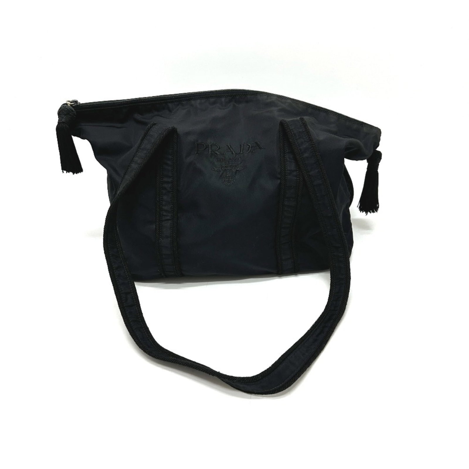 Shoulder bag tote nylon handbag prada: Shoulder bag tote nylon handbag prada Black Prada nylon shoulder bag tote with clean lines and classic design. Made from durable nylon, this 28cm x 45cm x 9cm tote features a timeless look perfect