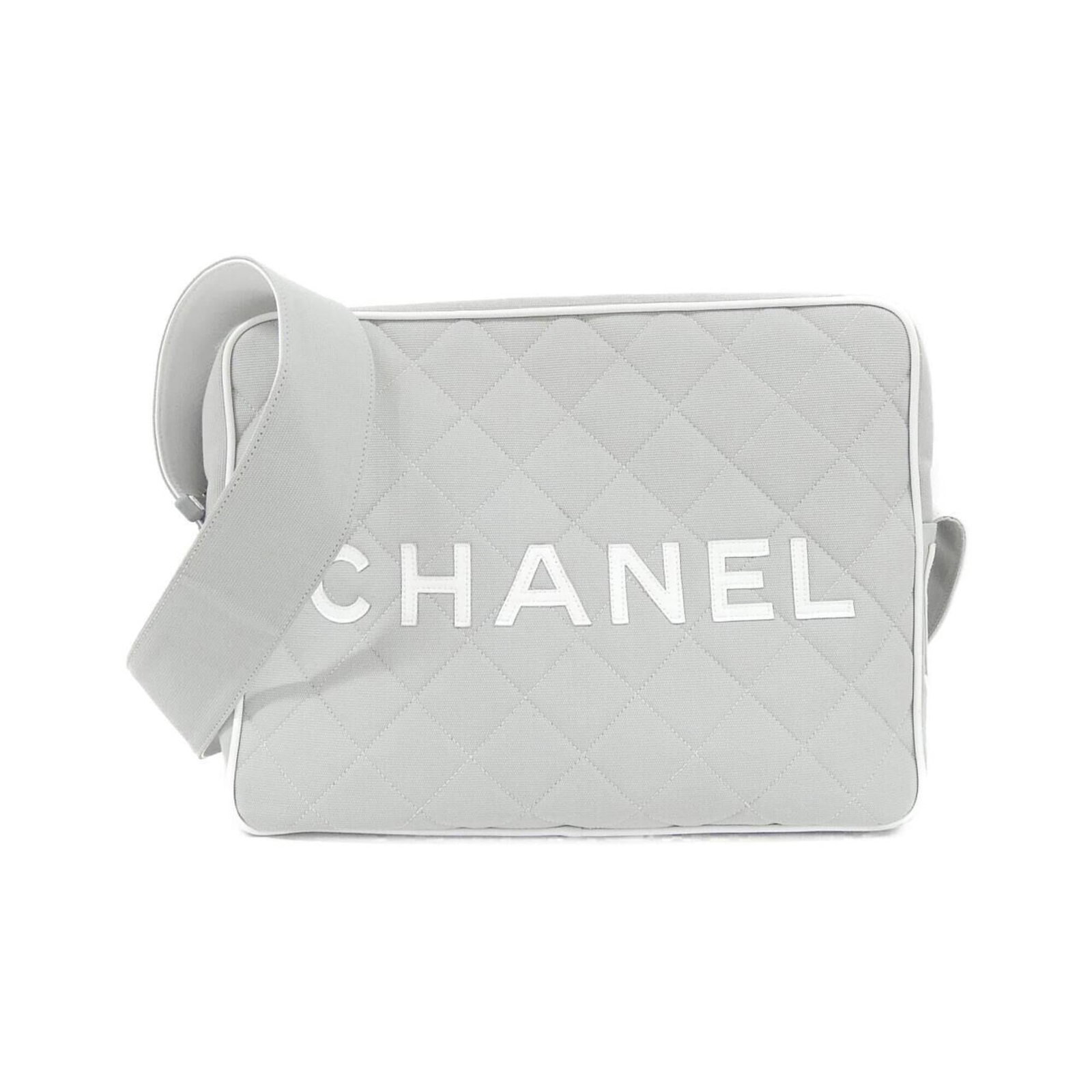 Shoulder bag canvas by Chanel: Shoulder bag canvas by Chanel Canvas by Chanel shoulder bag in gray and white, featuring silver hardware. Made from canvas material with dimensions of 24cm x 32cm x 9.5cm. A classic design with a