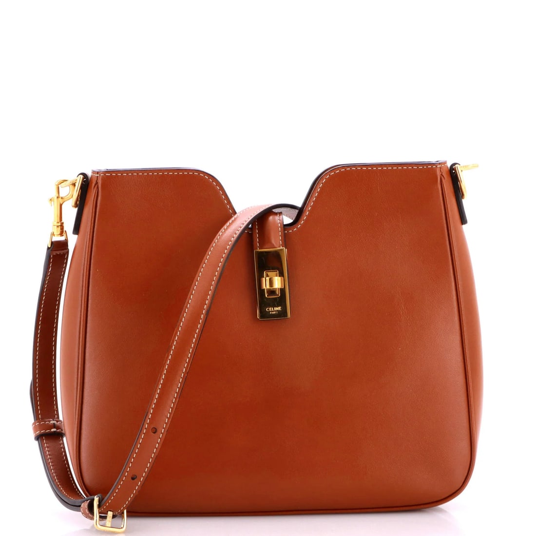 Celine Camille 16 Soft Shoulder Bag Leather Small: Celine Camille 16 Soft Shoulder Bag Leather Small The Celine Camille 16 Soft Shoulder Bag Leather Small boasts sleek, brown leather exterior with gold hardware. Measuring 8.5" in height and 9.5" in wi
