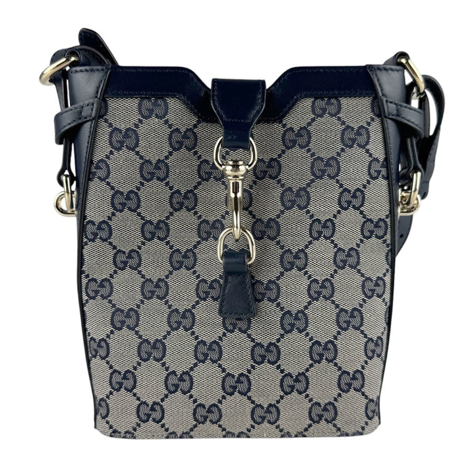 Shoulder Bag Canvas Leather Gucci: Shoulder Bag Canvas Leather Gucci GG canvas and leather come together in this classic Gucci shoulder bag, available in navy and red colors. Measuring 19cm x 16cm x 5cm, it's a stylish and compact