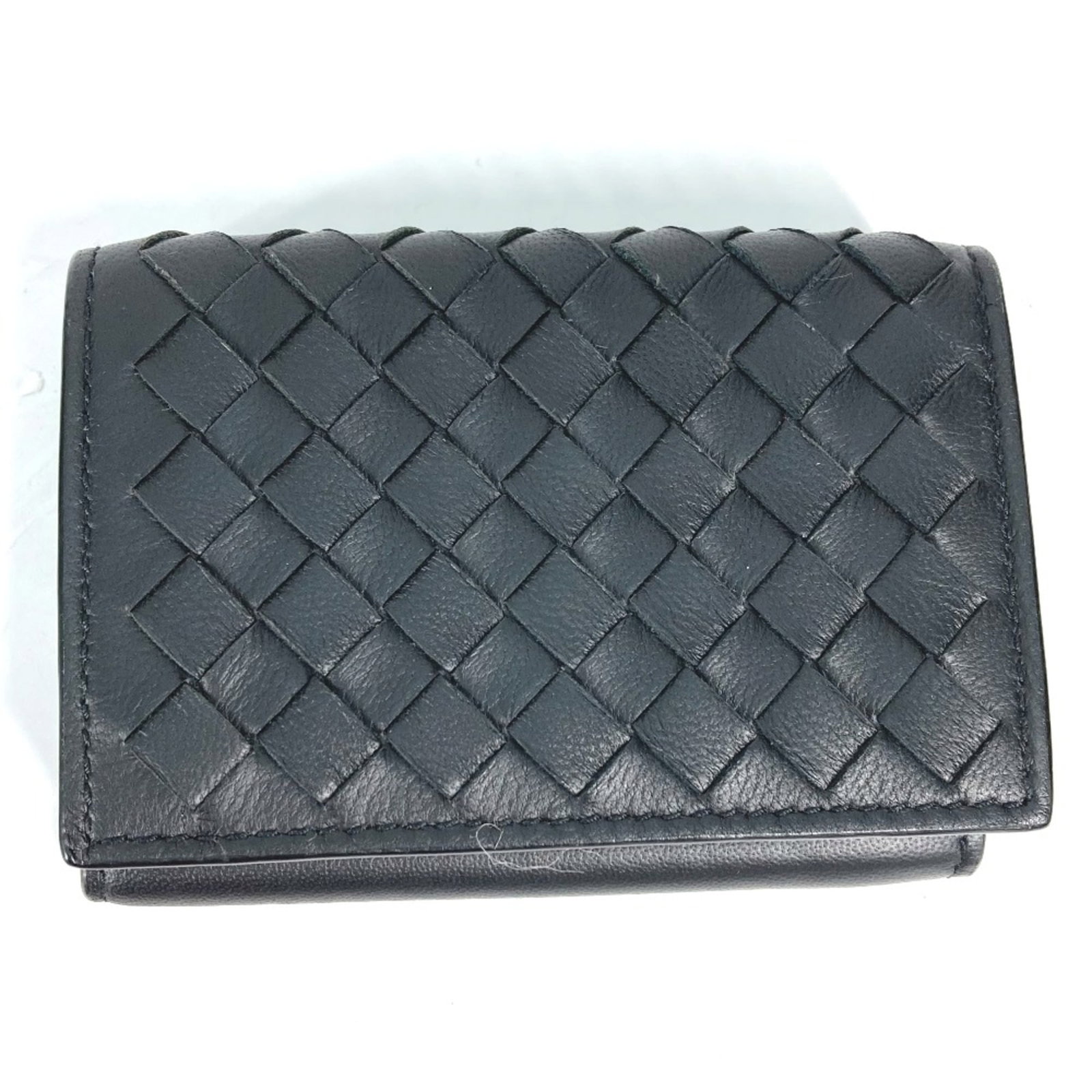 Veneta Wallet Tri Fold Leather: Veneta Wallet Tri Fold Leather The Veneta Wallet Tri Fold Leather features a sleek black leather design, measuring 10cm x 7cm in width and 3.9cm x 2.8cm in height. Made from high-quality leather, this