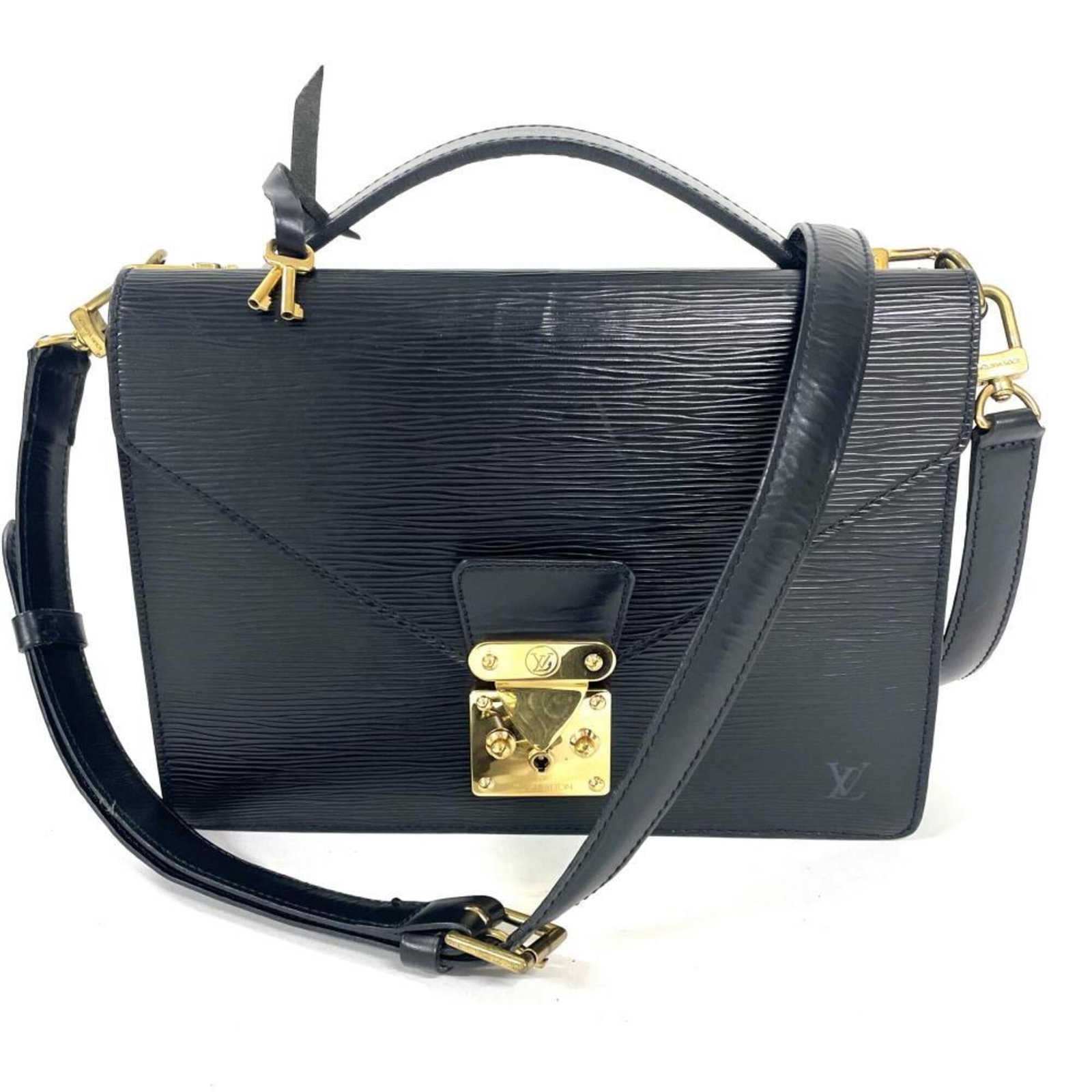 Louis Vuitton Handbag Epi Leather: Louis Vuitton Handbag Epi Leather Epi leather construction provides durability and a distinctive look. This black Louis Vuitton handbag features classic design elements, making it a timeless