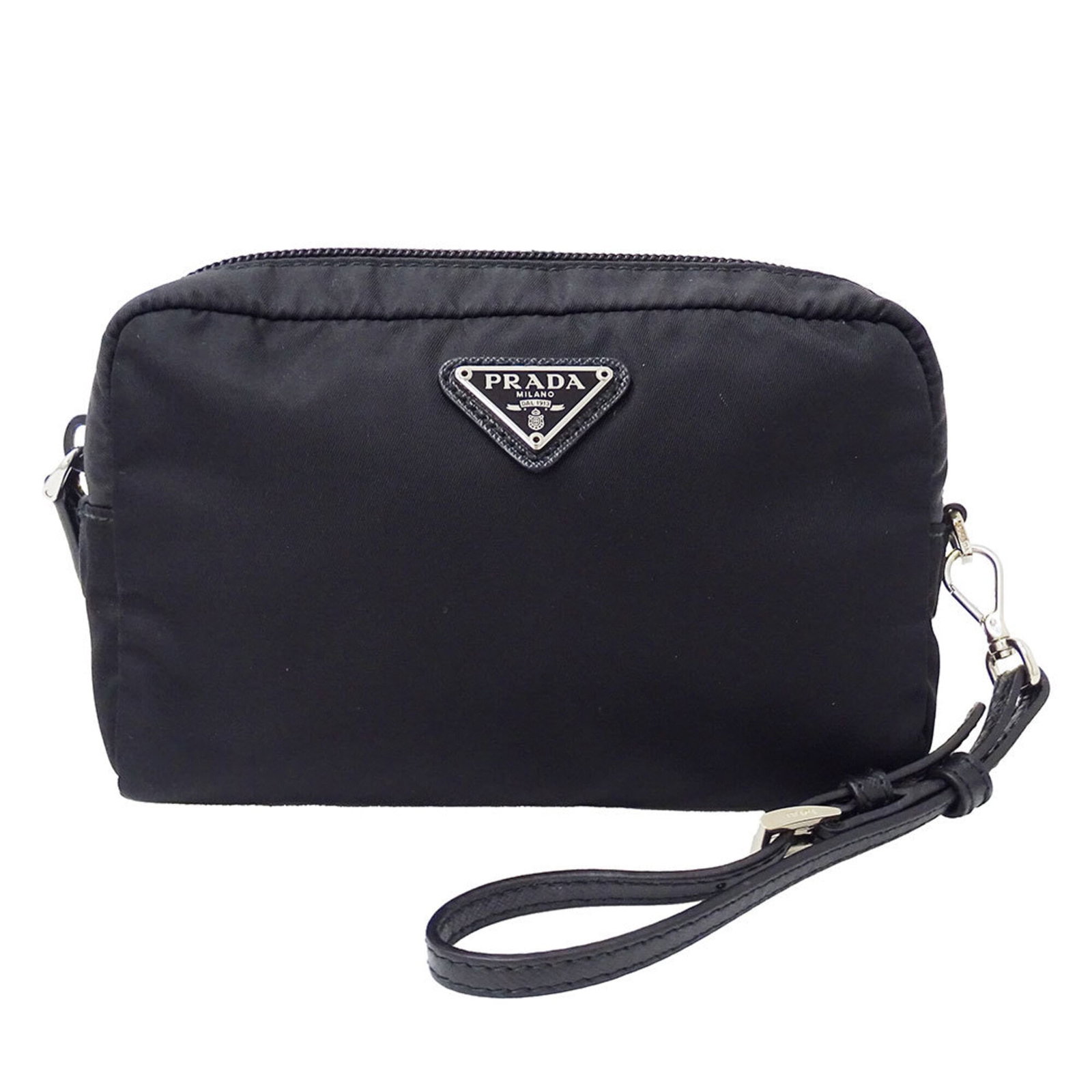 Handbag Prada Nylon: Handbag Prada Nylon This Prada Nylon handbag features a sleek black design, made from high-quality nylon material. Measuring 10cm x 16cm x 5cm, it has a compact size that makes it easy to carry. The