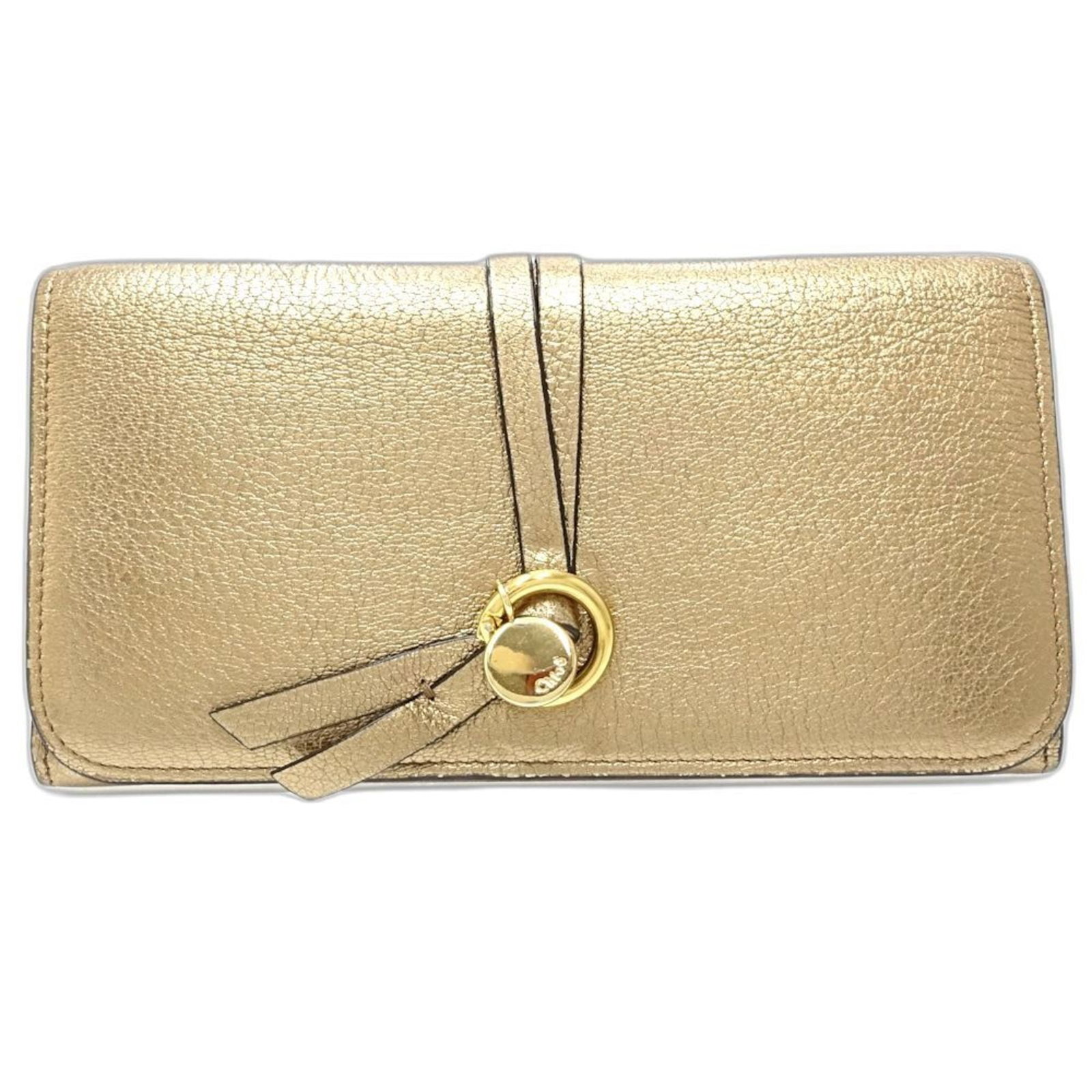 Chlo Long Wallet (Bi-Fold) Leather: Chlo Long Wallet (Bi-Fold) Leather Chlo Long Wallet (Bi-Fold) Leather features a metallic gold finish and measures 9.5cm x 19cm x 2cm, making it a stylish accessory for everyday use. The bi-fold