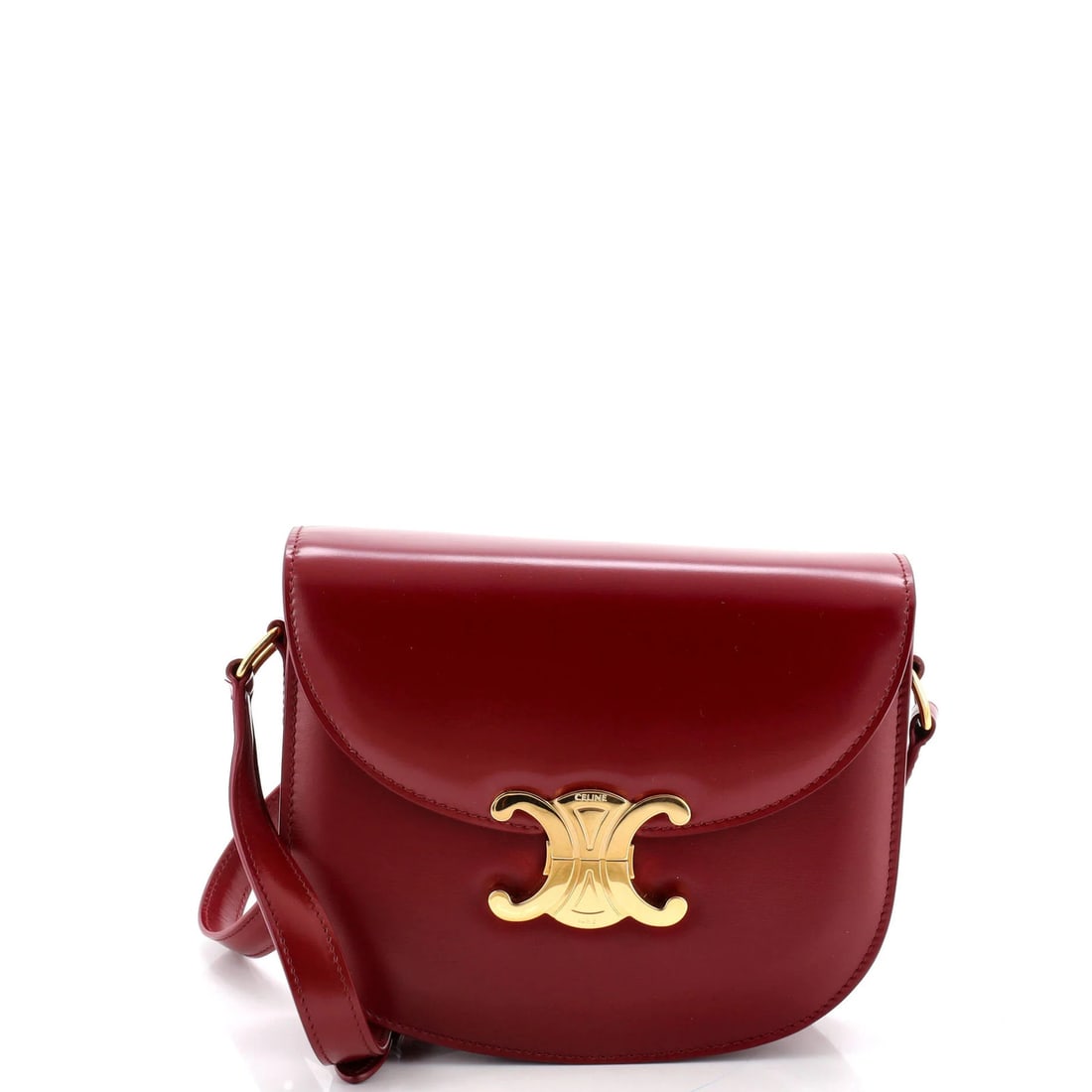 Celine Triomphe Besace Clea Flap Bag Leather: Celine Triomphe Besace Clea Flap Bag Leather Celine Triomphe Besace Clea Flap Bag Leather, a striking red leather shoulder bag with gold hardware. Measuring 6" tall and 7.5" wide, it features a flap c