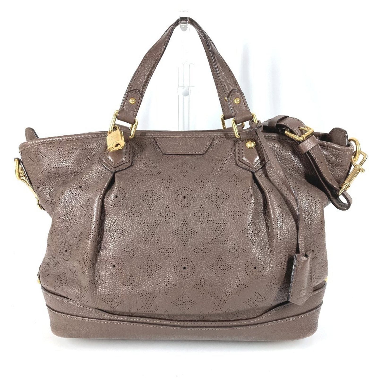 Mahina Monogram Leather Shoulder Bag Tote Vuitton Louis: Mahina Monogram Leather Shoulder Bag Tote Vuitton Louis Brown Monogram Mahina Leather Louis Vuitton Shoulder Bag Tote with Classic Design. This iconic shoulder bag features the signature monogram patt