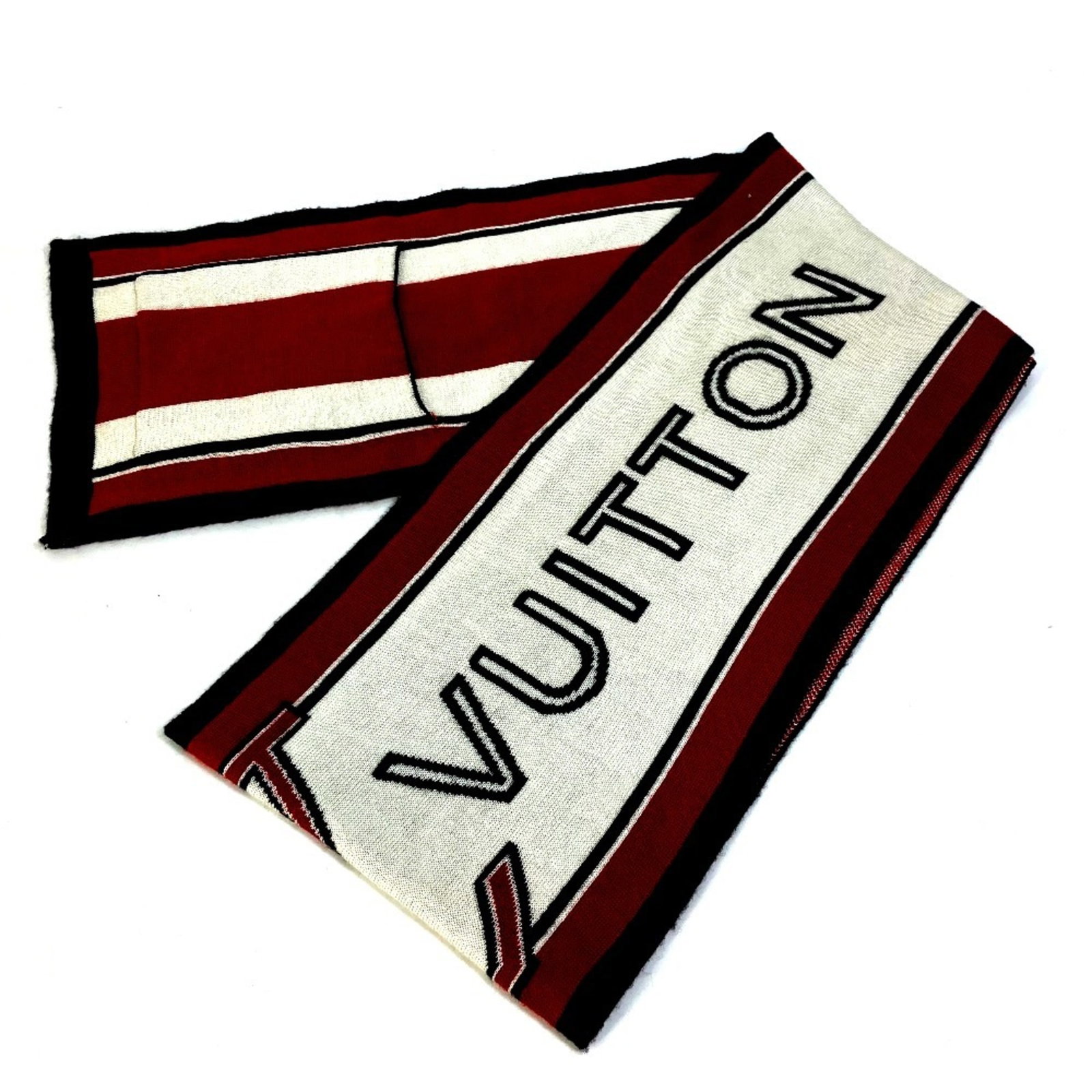 Stole wool by Louis Vuitton: Stole wool by Louis Vuitton Stole wool by Louis Vuitton, measuring 22cm x 2m in size, boasts a striking red color and made from high-quality wool material. The stole's distinctive design makes it a no