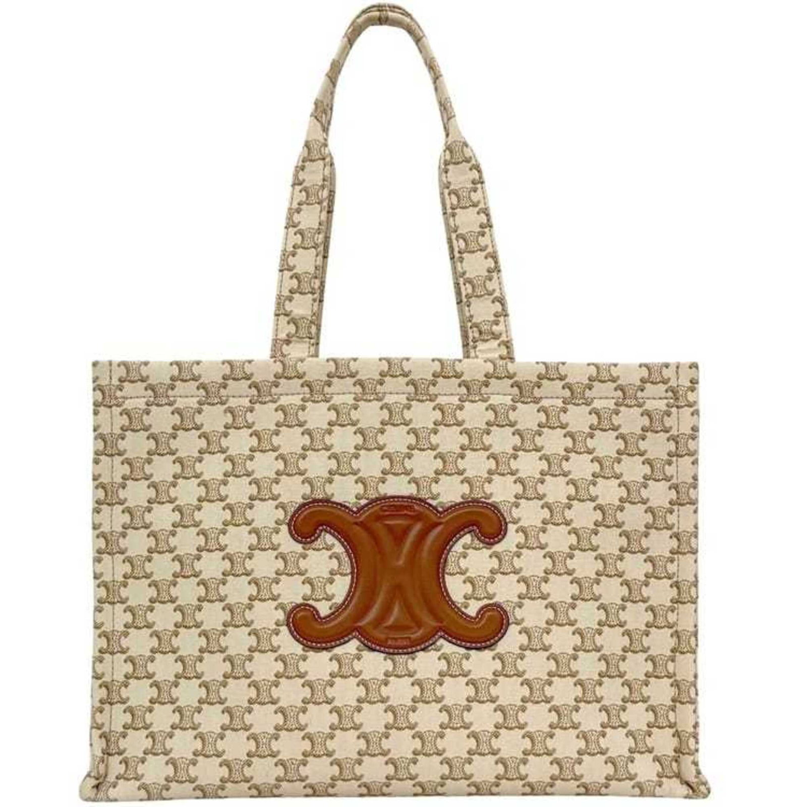 Canvas tote bag by Celine: Canvas tote bag by Celine Canvas tote bag by Celine, made from high-quality canvas material and available in beige and brown colors. This stylish tote measures 29cm x 41cm x 17cm, making it a practica
