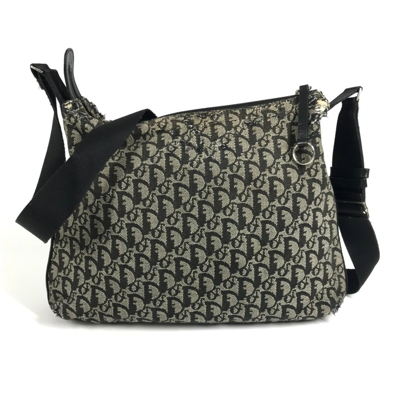 Canvas shoulder bag leather by Christian Dior: Canvas shoulder bag leather by Christian Dior Canvas shoulder bag by Christian Dior, crafted from high-quality leather and canvas in sleek black. Measuring 24cm x 28cm x 9.5cm, this stylish accessory