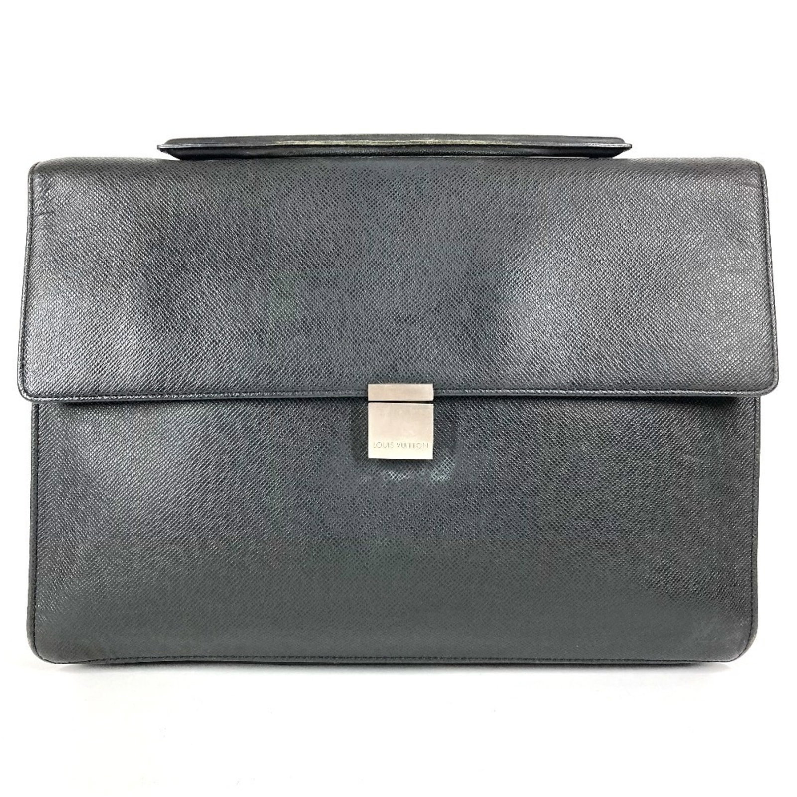 Handbag Leather Taiga Briefcase Louis Vuitton: Handbag Leather Taiga Briefcase Louis Vuitton Taiga leather briefcase in Ardoise and Black, crafted by Louis Vuitton. Made from high-quality Taiga leather, this classic design combines timeless