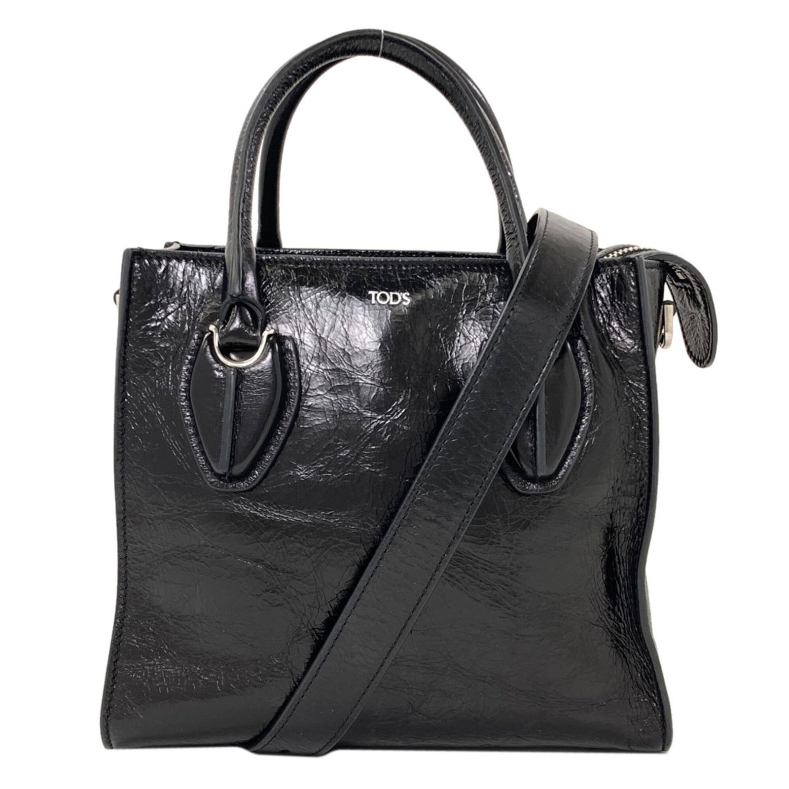 Tod'S Handbag Leather: Tod'S Handbag Leather Tod's Handbag Leather is made from high-quality leather, featuring a sleek black design with a zipper closure. Measuring 20cm x 22cm x 11cm, it has a stylish handle length of