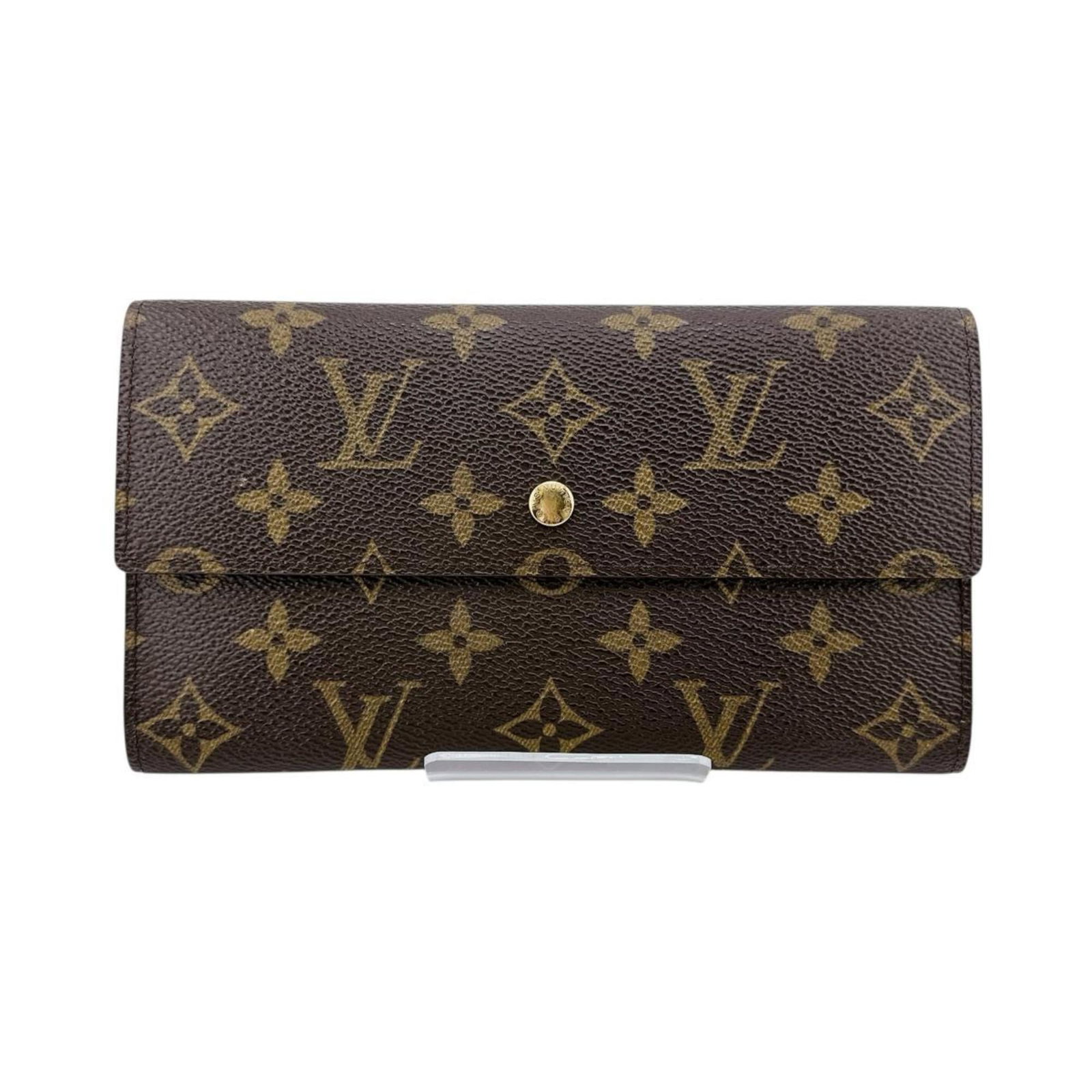Monogram Wallet Long Tri-Fold Vuitton Louis: Monogram Wallet Long Tri-Fold Vuitton Louis Monogram Wallet Long Tri-Fold Vuitton Louis - A Classic Design from France. This long tri-fold wallet features the iconic Monogram pattern, a signature desi