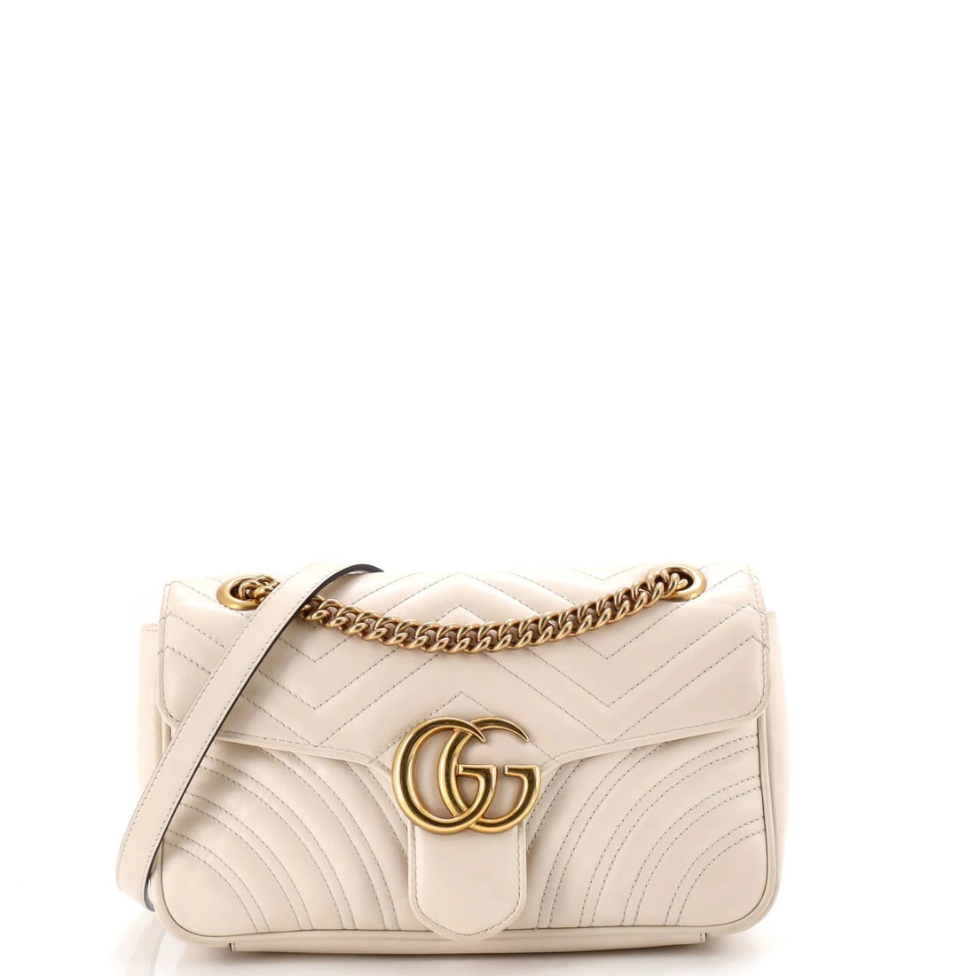 Gucci GG Marmont Flap Bag Matelasse Leather Small: Gucci GG Marmont Flap Bag Matelasse Leather Small Small Gucci GG Marmont Flap Bag Matelasse Leather Cross Body Bag in Neutral Exterior with Gold Hardware, featuring minor scuffs and creases on the ext