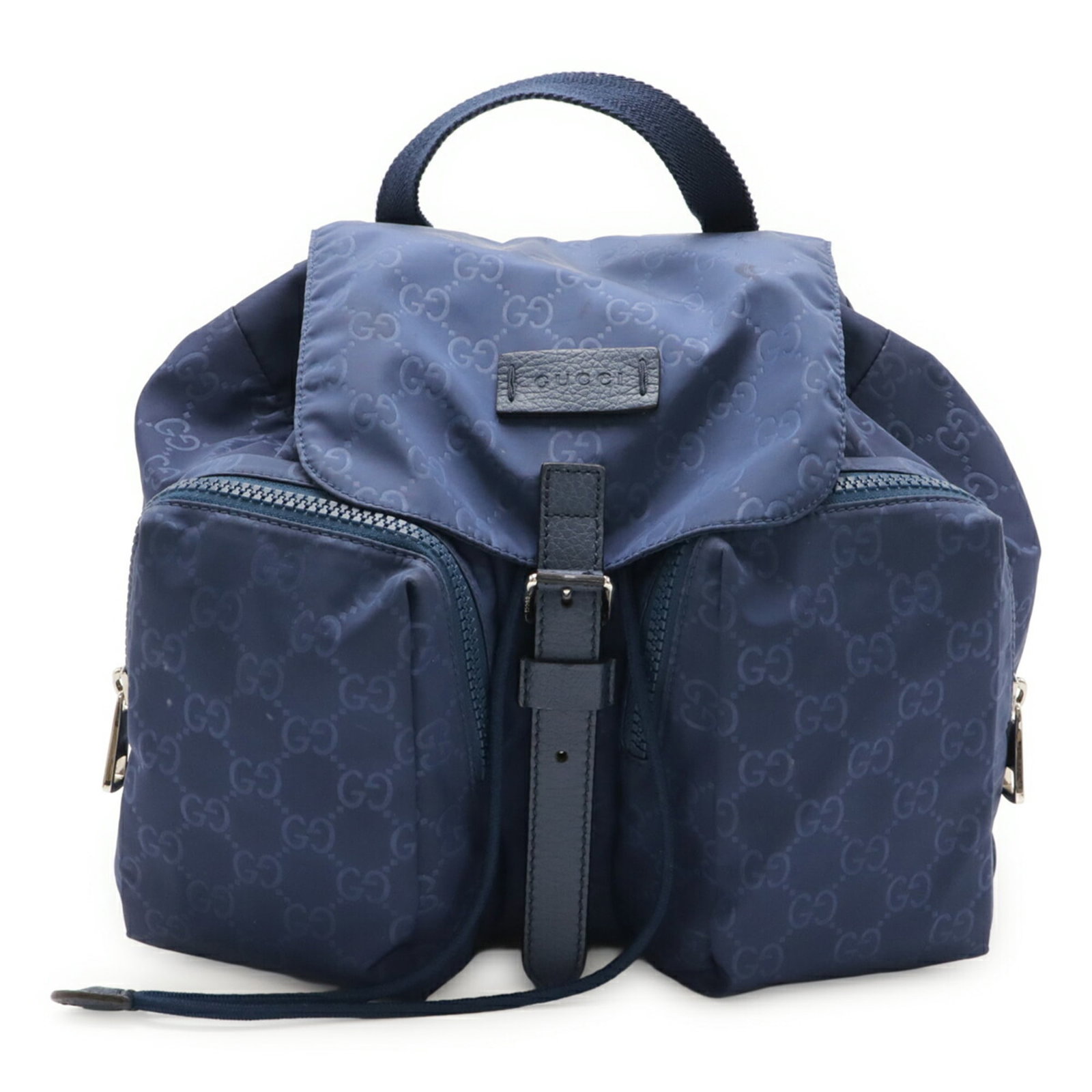 Nylon Leather Backpack by Gucci: Nylon Leather Backpack by Gucci Nylon and leather combine in this Gucci backpack, featuring a navy color and compact size. Weighing 480g, it measures 29.5cm x 31cm x 13.5cm. The nylon material is pair