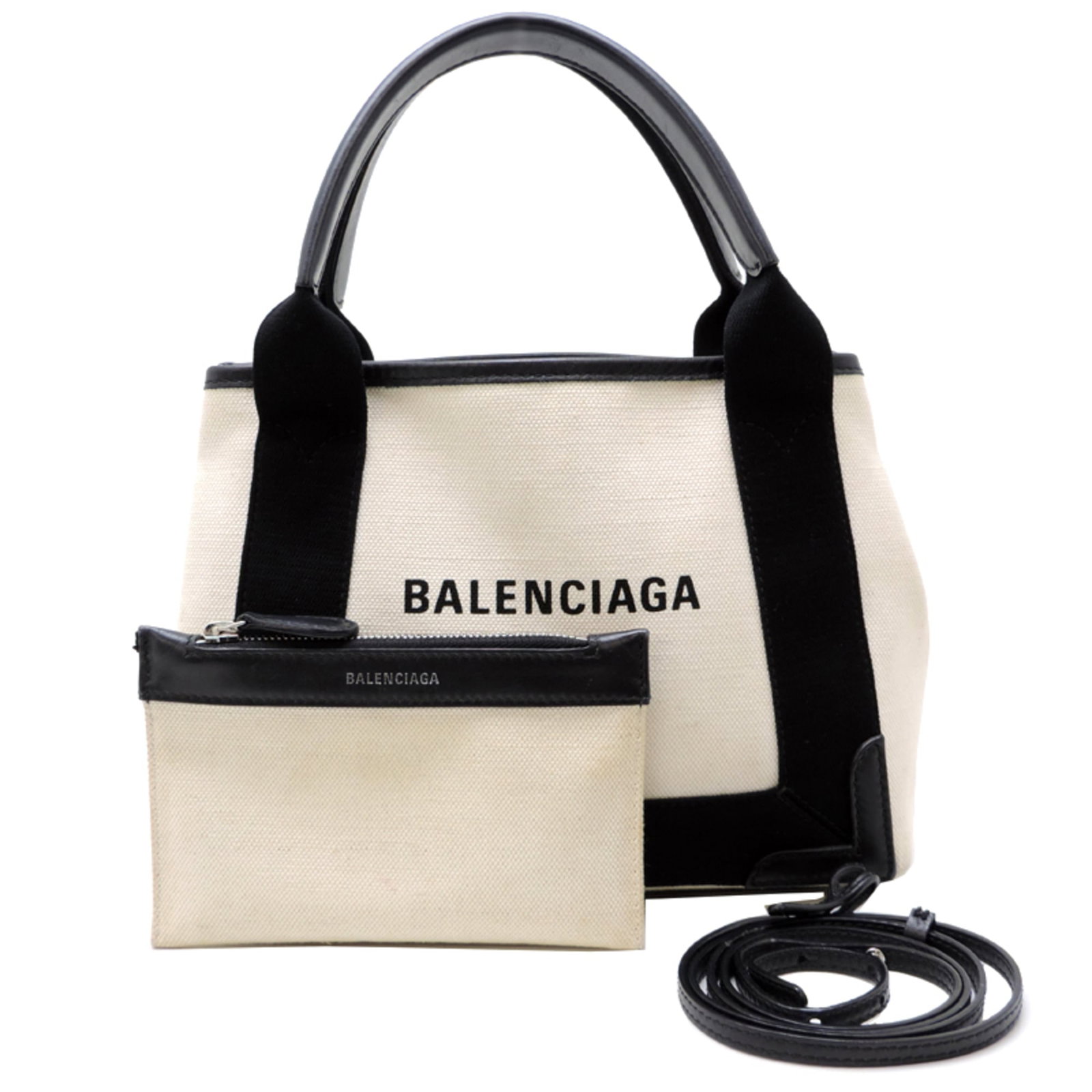 Canvas leather pouch from Balenciaga: Canvas leather pouch from Balenciaga Canvas leather pouch from Balenciaga, featuring a sleek black and white design. Made from high-quality canvas and leather, this stylish pouch measures 20cm x 26cm 