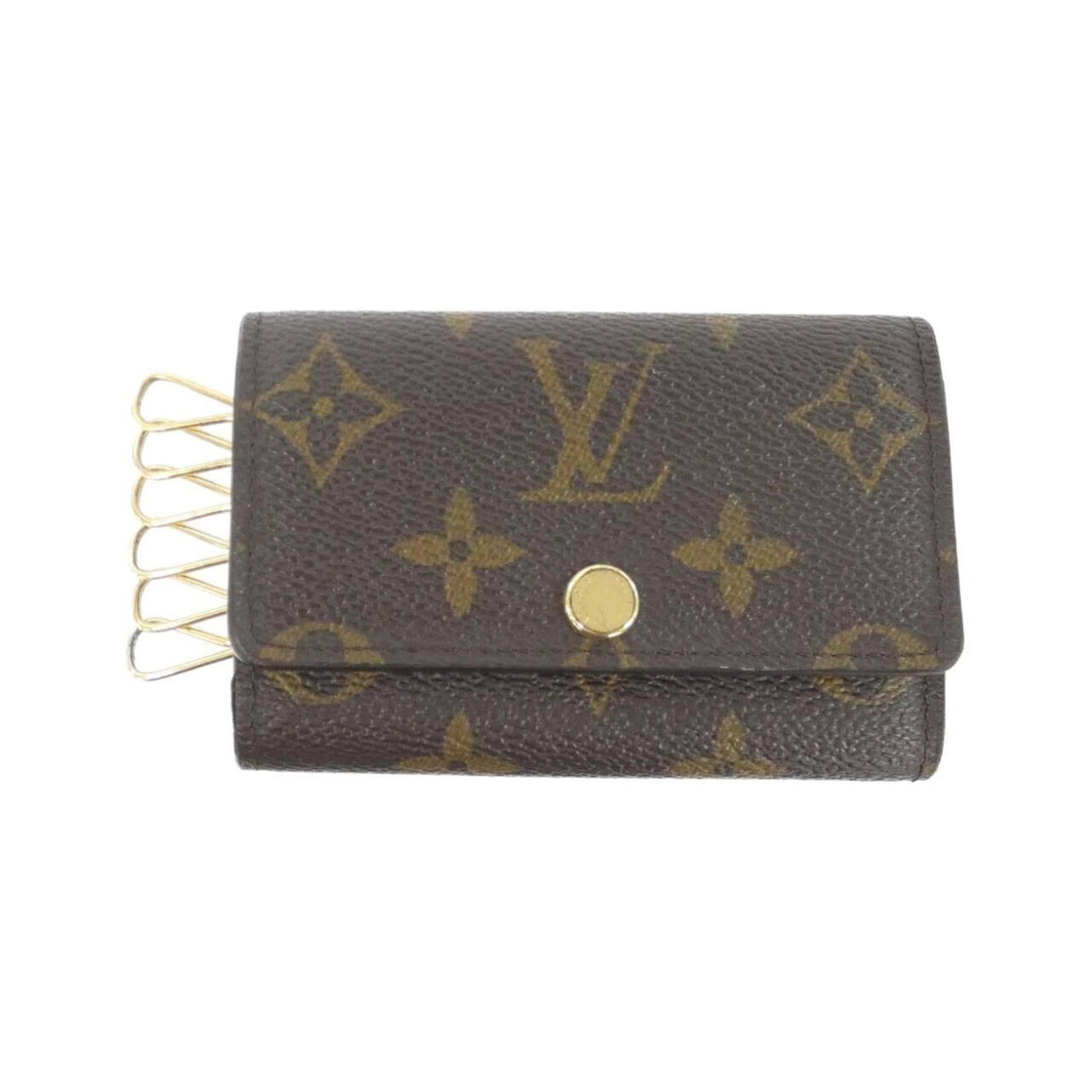 Louis Vuitton Keycase Coated Canvas: Louis Vuitton Keycase Coated Canvas Coated canvas construction provides durability and protection for your keys. The classic brown color and compact size make it a practical accessory for daily use. M