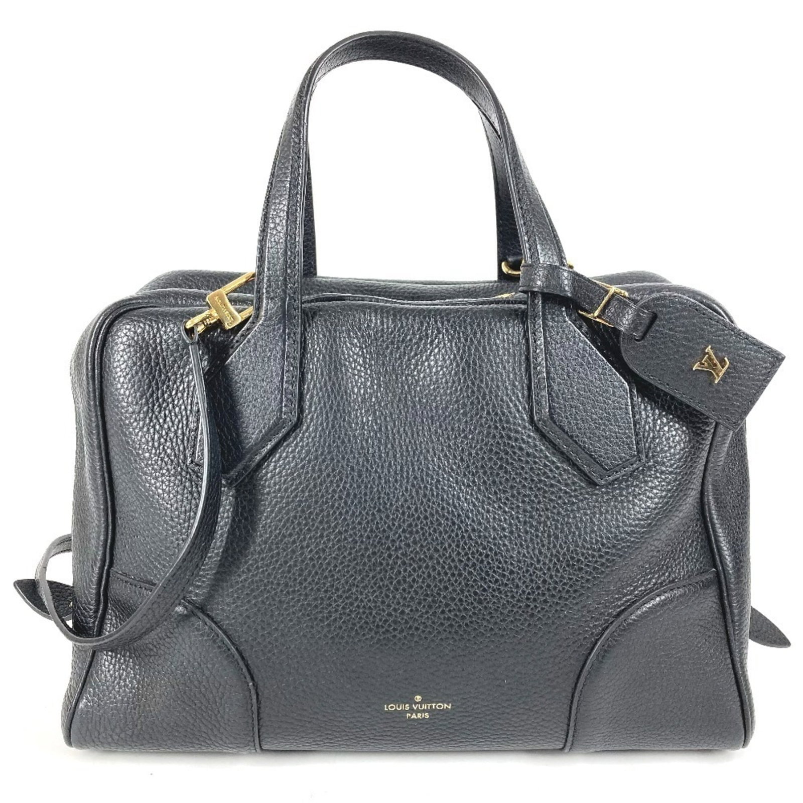 Louis Vuitton Handbag Tote Bag Leather: Louis Vuitton Handbag Tote Bag Leather Taurillon leather, a signature Louis Vuitton material, adorns this sleek black tote bag. Made from high-quality leather, the bag's classic design and timeless