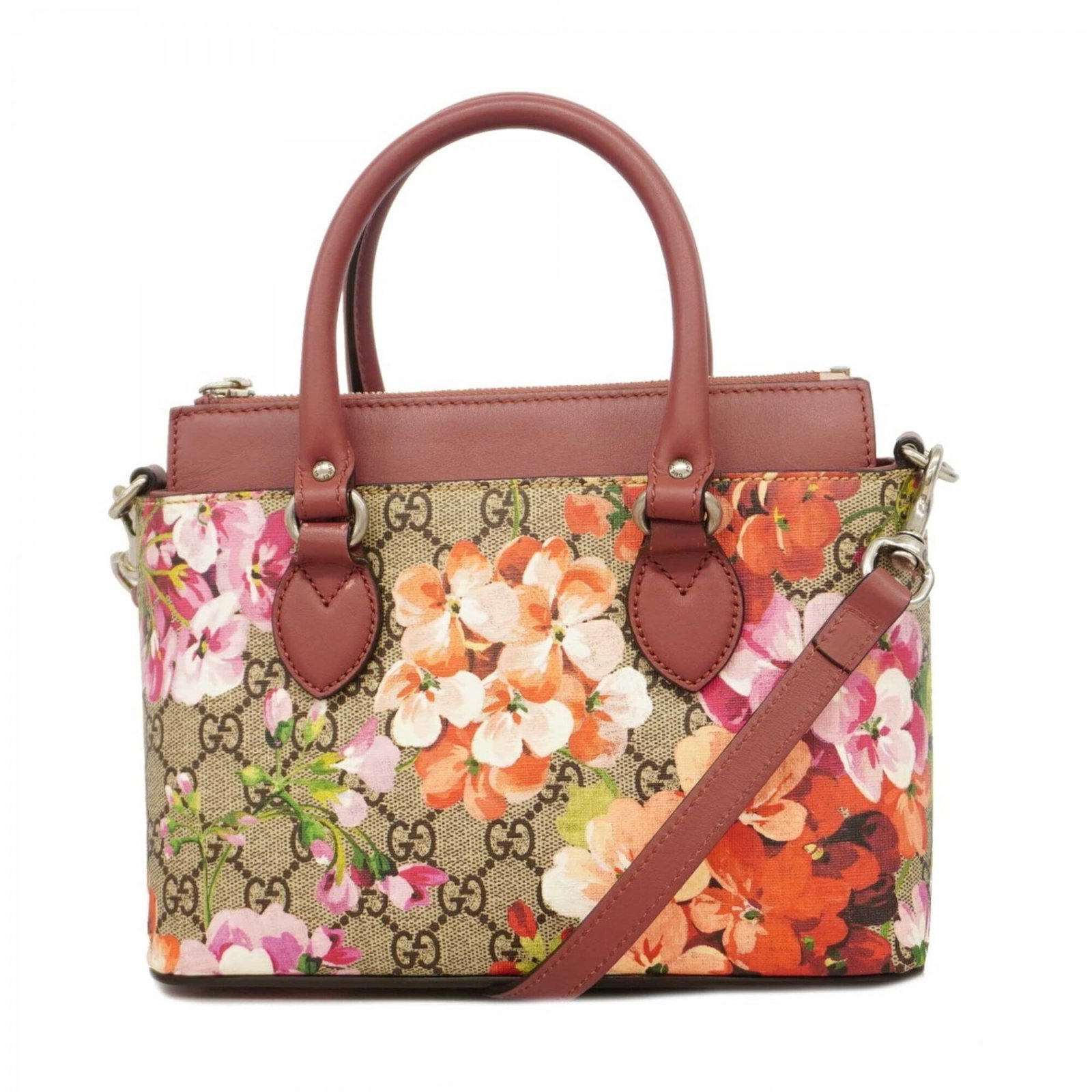 PVC Handbag Gucci: PVC Handbag Gucci The Gucci PVC handbag boasts a striking multi-color design, featuring silver hardware for a sleek and modern look. With its compact size and durable PVC material, this bag makes a