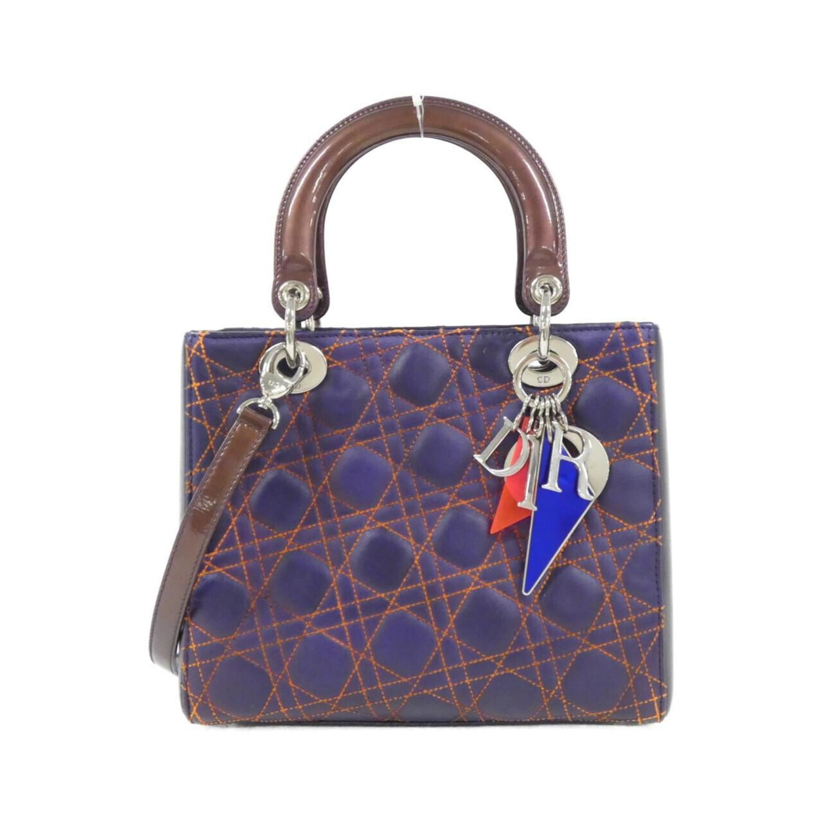 Handbag Christian Dior Leather: Handbag Christian Dior Leather Christian Dior's Lady Dior handbag boasts elegant lines and premium leather construction, with intricate enamel details adding a touch of sophistication. Measuring 20cm 