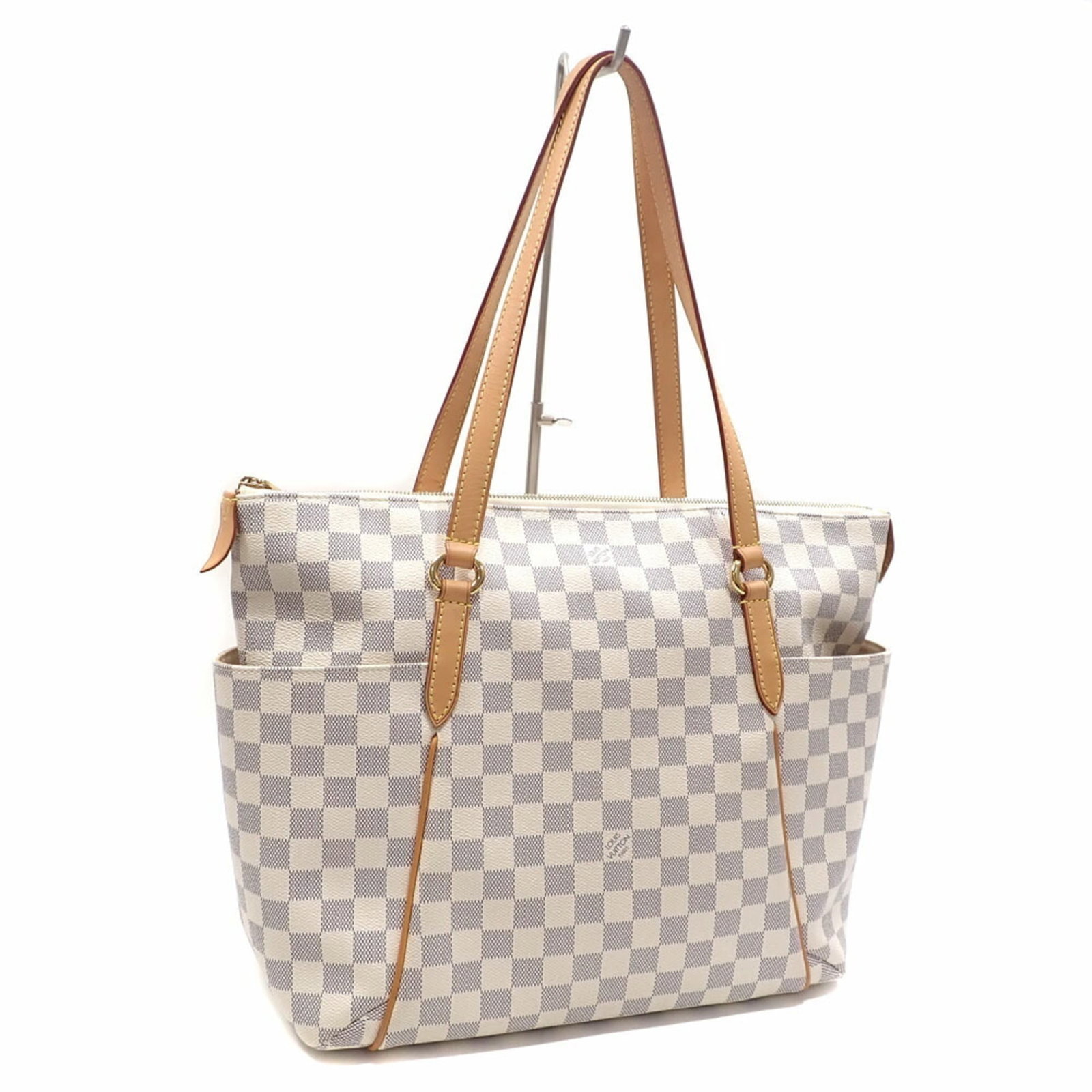 Damier Azur Tote Bag by Louis Vuitton: Damier Azur Tote Bag by Louis Vuitton Damier Azur Tote Bag by Louis Vuitton - A timeless and iconic tote bag from the renowned French fashion house. Made with high-quality Damier Azur material, this