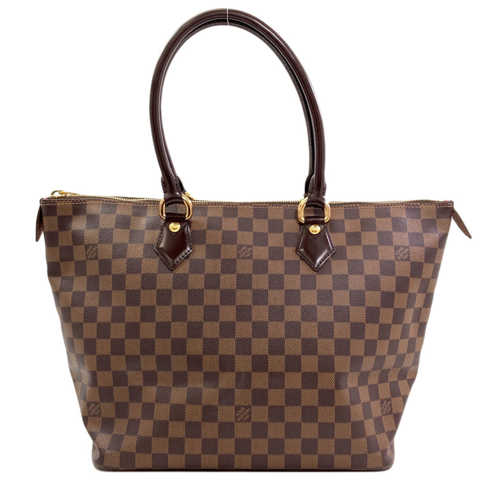Damier Canvas Tote Bag by Louis Vuitton: Damier Canvas Tote Bag by Louis Vuitton Damier Canvas Tote Bag by Louis Vuitton features the iconic Damier pattern in Ebene, a classic and timeless design. Made from high-quality Damier canvas, this t