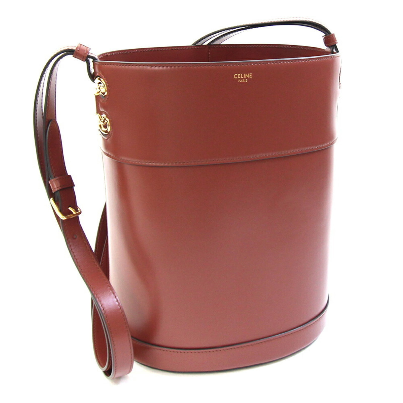 Celine bag leather: Celine bag leather The Celine bag leather is made from high-quality Italian leather, available in the rich red-brown color. This shoulder bag measures 26cm x 22.5cm x 16cm and features a classic