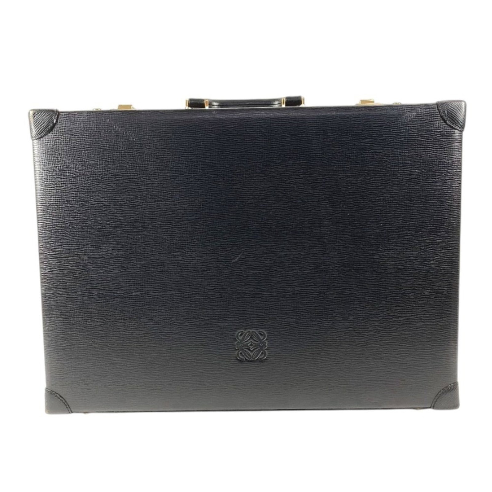Case handbag attach tote leather bag: Case handbag attach tote leather bag Black leather attach case tote bag from Loewe, measuring 34cm x 47cm x 14.5cm, features a classic design with clean lines and timeless elegance. The bag's rich