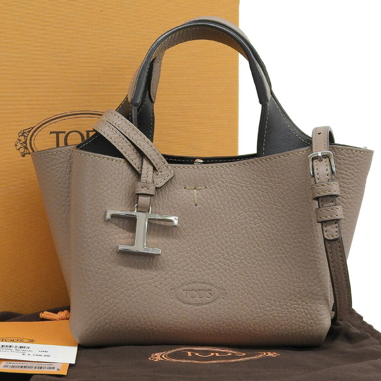 Tod'S Handbag Leather: Tod'S Handbag Leather Tod's Handbag Leather is made from high-quality leather, bearing the signature of the renowned Italian luxury brand. This elegant beige handbag measures 12.5cm x 15.5cm x 11cm