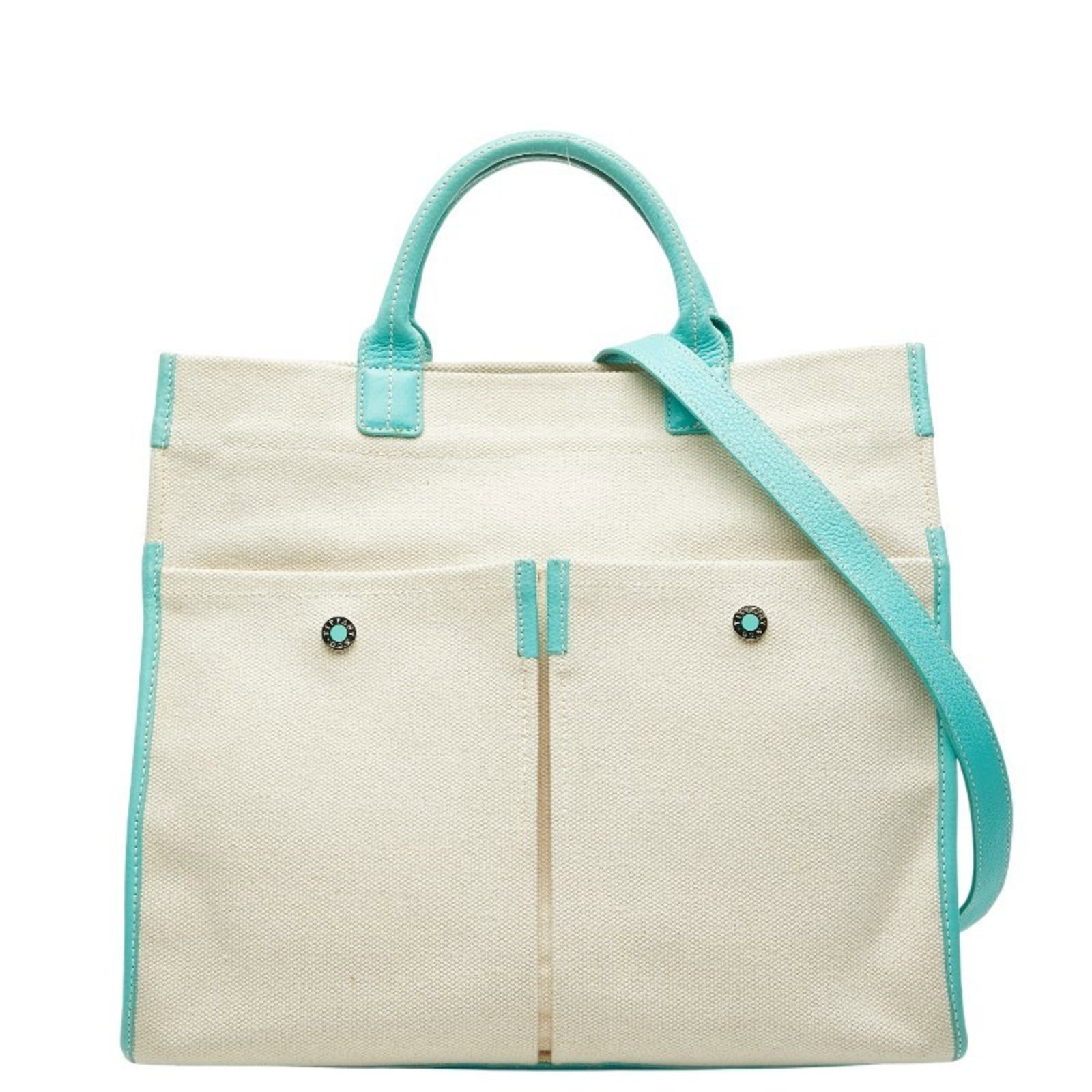 Tiffany Handbag Shoulder Bag Canvas Leather: Tiffany Handbag Shoulder Bag Canvas Leather Tiffany blue canvas and leather come together in this beautiful shoulder bag, measuring 32cm x 37cm x 17cm. The item includes a dust bag and adjustable shou
