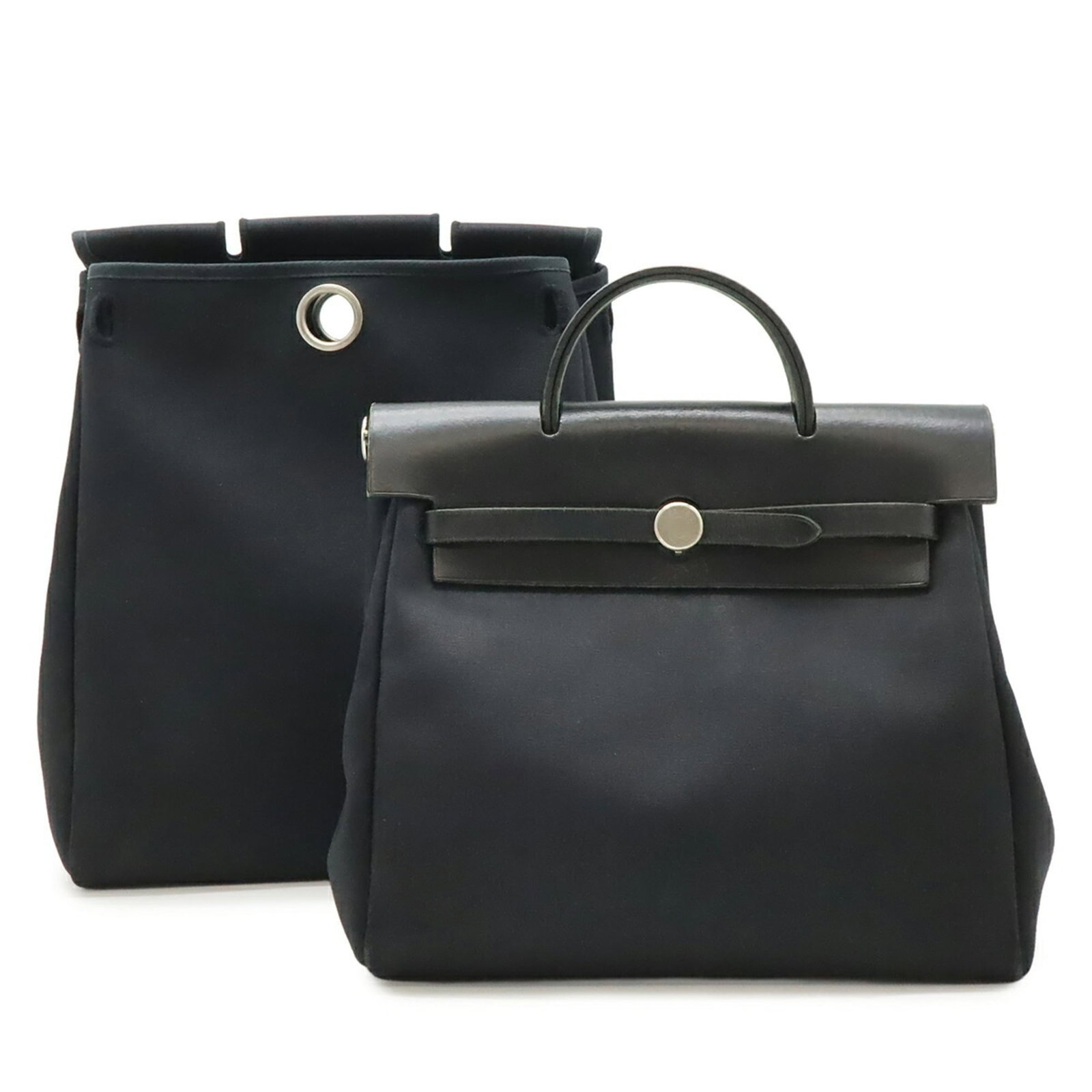 Hermes Backpack Handbag Toile Officier: Hermes Backpack Handbag Toile Officier Toile Officier backpack from iconic French fashion house Hermes, boasting classic design and timeless elegance. This sleek black handbag features the signature