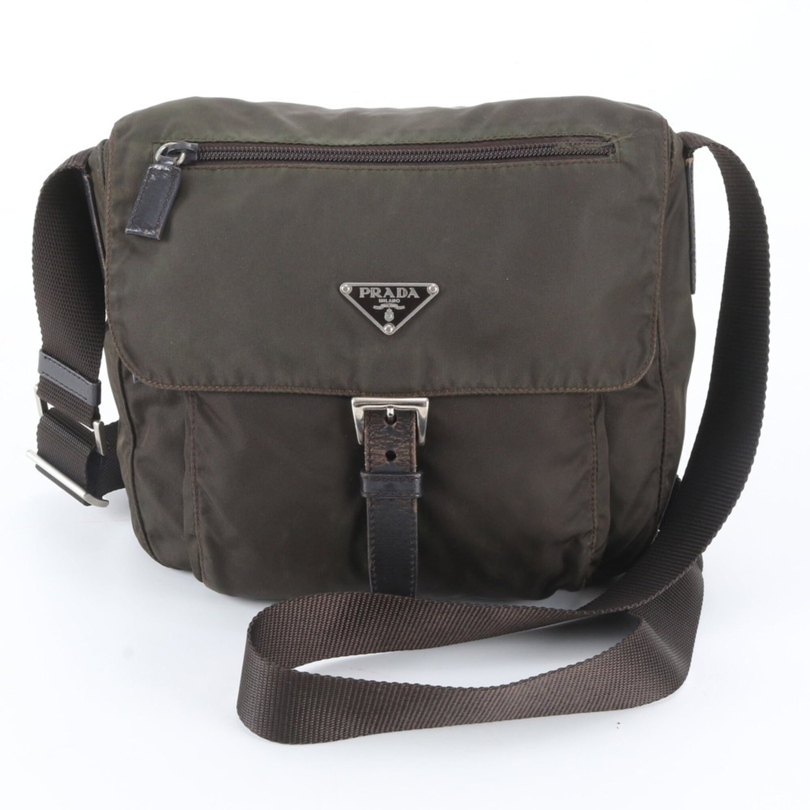 Nylon Leather Prada Messenger Bag Shoulder Bag: Nylon Leather Prada Messenger Bag Shoulder Bag Nylon and leather combine in this Prada Country messenger bag, available in brown, green, and khaki colors. Measuring 18cm x 22cm x 10cm, it features a u