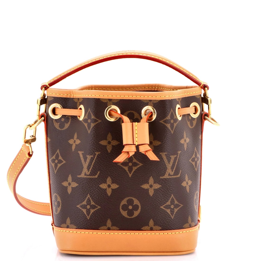 Louis Vuitton Noe NM Handbag Monogram Canvas Nano: Louis Vuitton Noe NM Handbag Monogram Canvas Nano Brown Louis Vuitton Noe NM Handbag Monogram Canvas Nano in Great Condition. This iconic bucket handbag features scuffs, edge wear, and minor creases