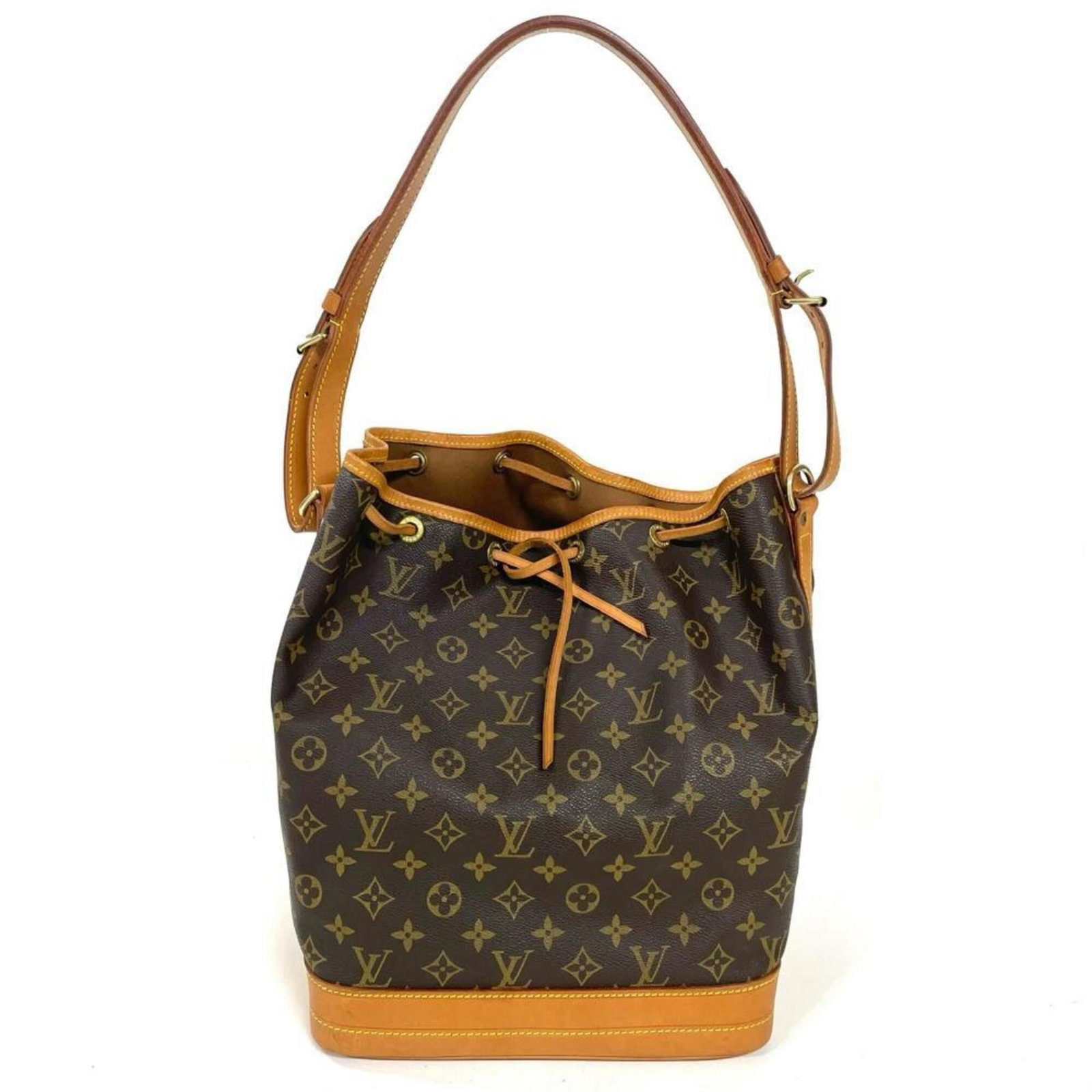 Shoulder Bag Monogram Canvas by Louis Vuitton: Shoulder Bag Monogram Canvas by Louis Vuitton Monogram canvas by Louis Vuitton, a timeless design element. This shoulder bag features the iconic monogram pattern in brown, crafted from high-quality