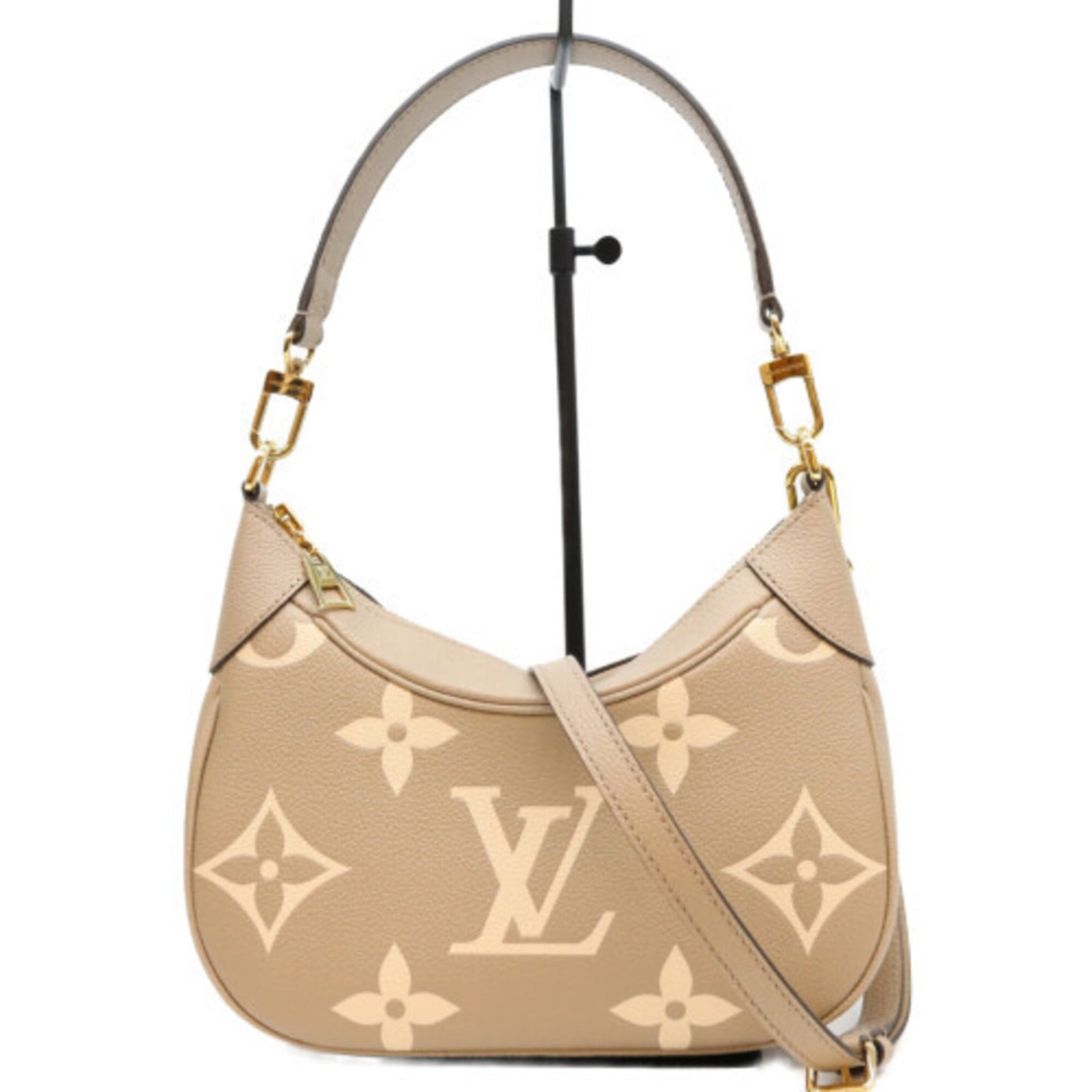 Shoulder bag monogram empreinte by Louis Vuitton: Shoulder bag monogram empreinte by Louis Vuitton Grayish, Ivory Monogram Empreinte Shoulder Bag by Louis Vuitton. This stylish shoulder bag features the iconic Monogram Empreinte pattern in a
