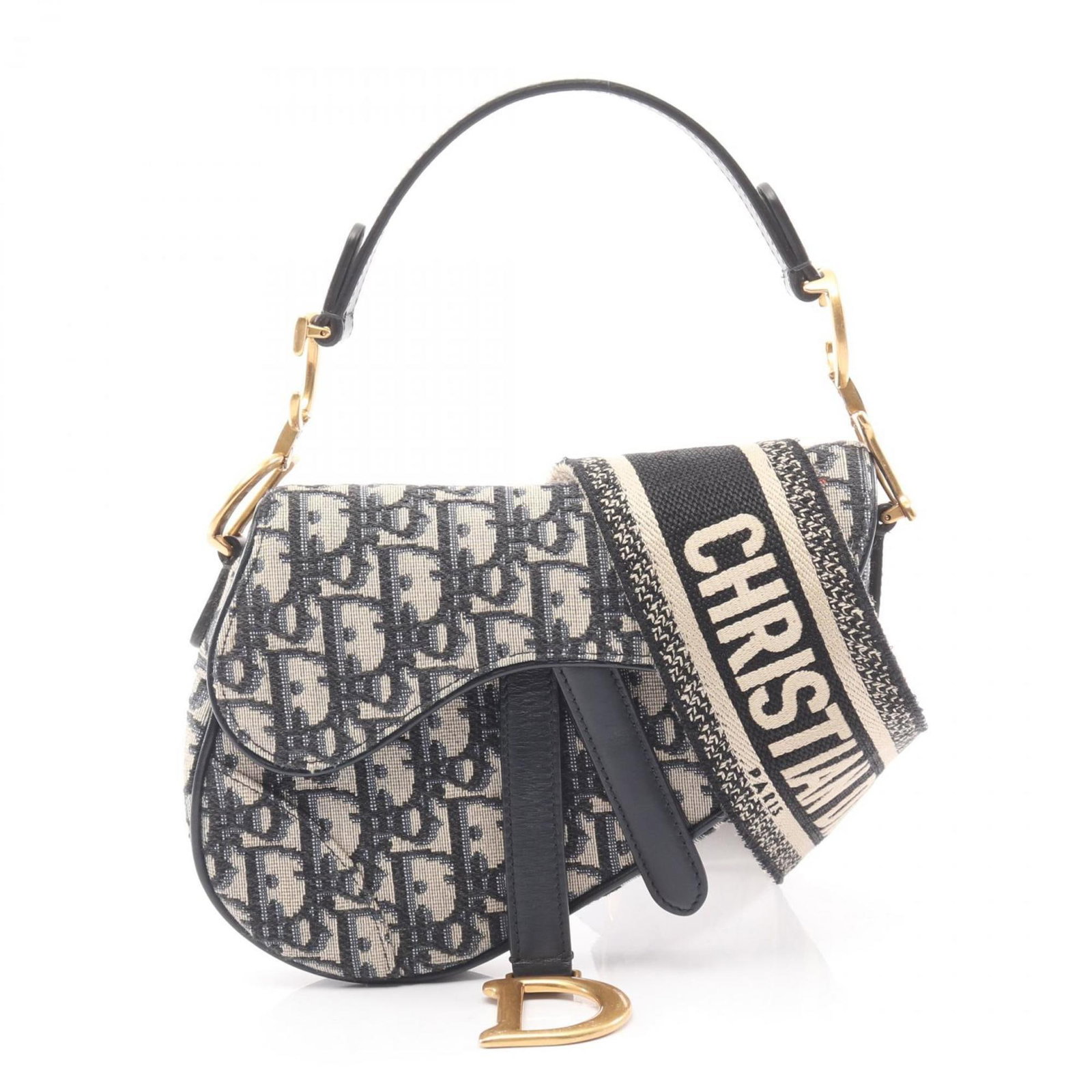Canvas leather saddle bag by Christian Dior: Canvas leather saddle bag by Christian Dior Canvas leather saddle bag by Christian Dior, featuring a classic design with beige, black, and navy color options. This stylish handbag boasts a canvas and