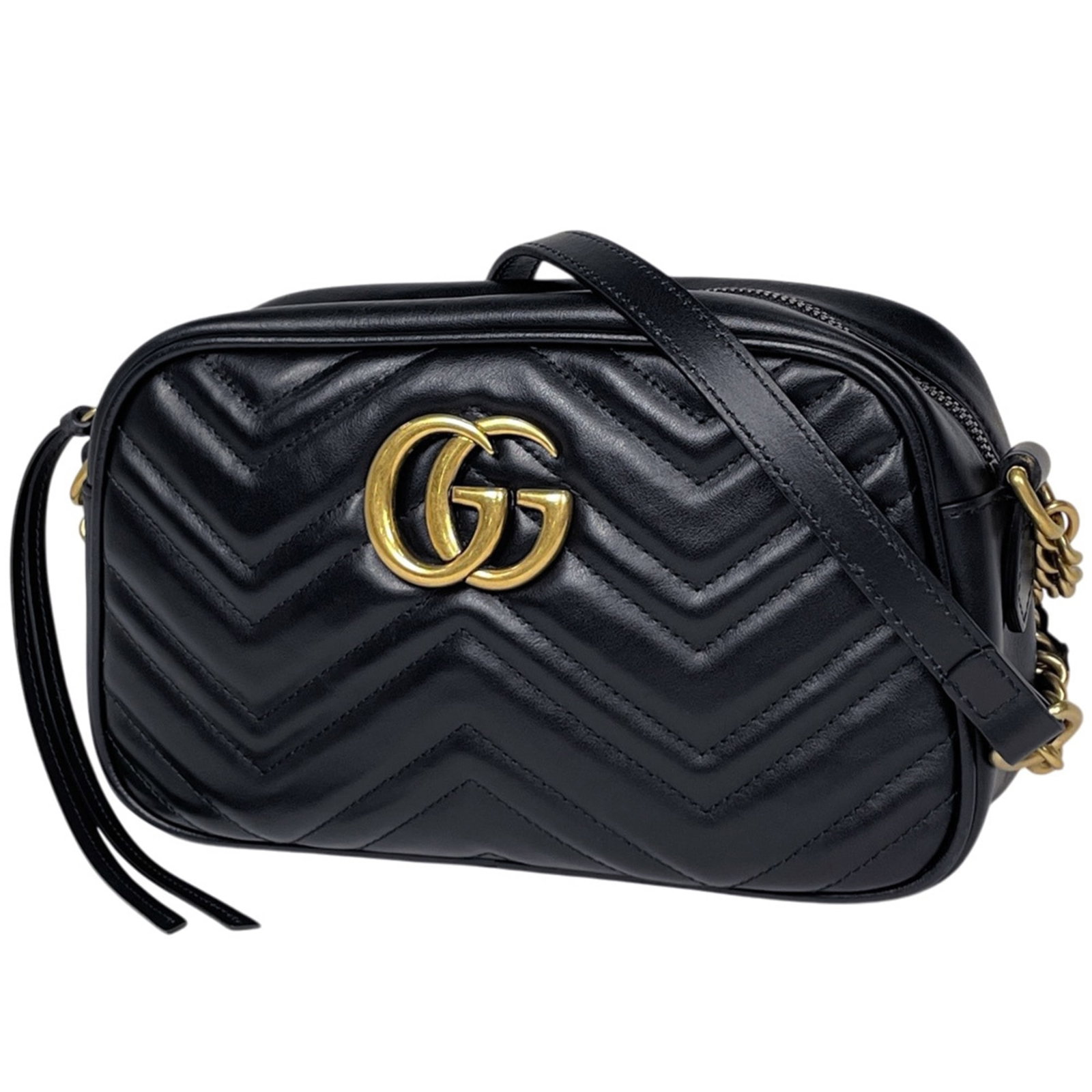 Gucci Shoulder Bag Leather: Gucci Shoulder Bag Leather Gucci's GG Marmont shoulder bag is crafted from high-quality leather, featuring a sleek black design. Measuring 13.5cm x 23cm x 7cm, this stylish accessory is perfect for ad