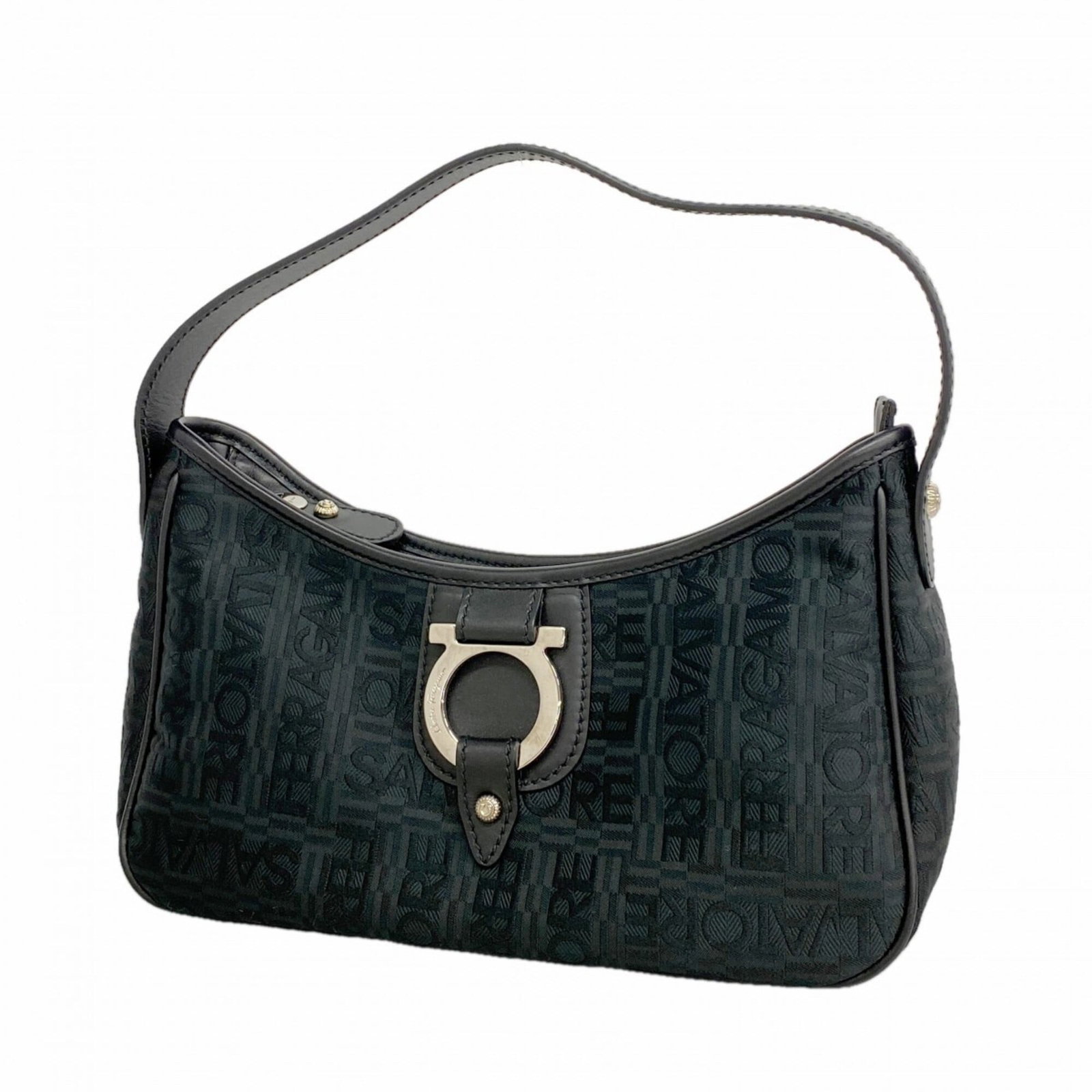 Salvatore Ferragamo Handbag Nylon Canvas: Salvatore Ferragamo Handbag Nylon Canvas Salvatore Ferragamo's iconic nylon canvas handbag boasts sleek black and silver hardware, making for a chic and modern accessory. With its compact dimensions