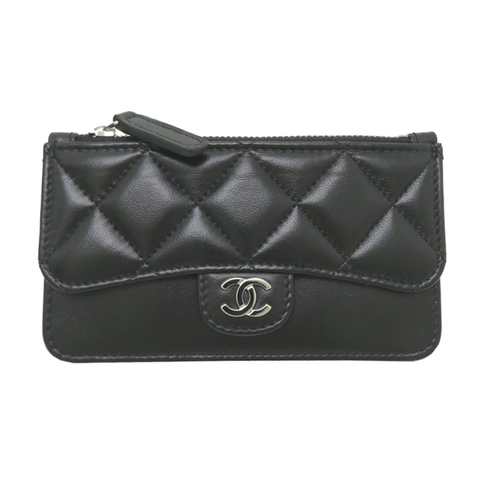 Calfskin card case by Chanel: Calfskin card case by Chanel Calfskin card case by Chanel, crafted from high-quality grained Calfskin, features a sleek and sophisticated design. Measuring 7.5cm x 12.5cm x 1cm, it provides ample spac