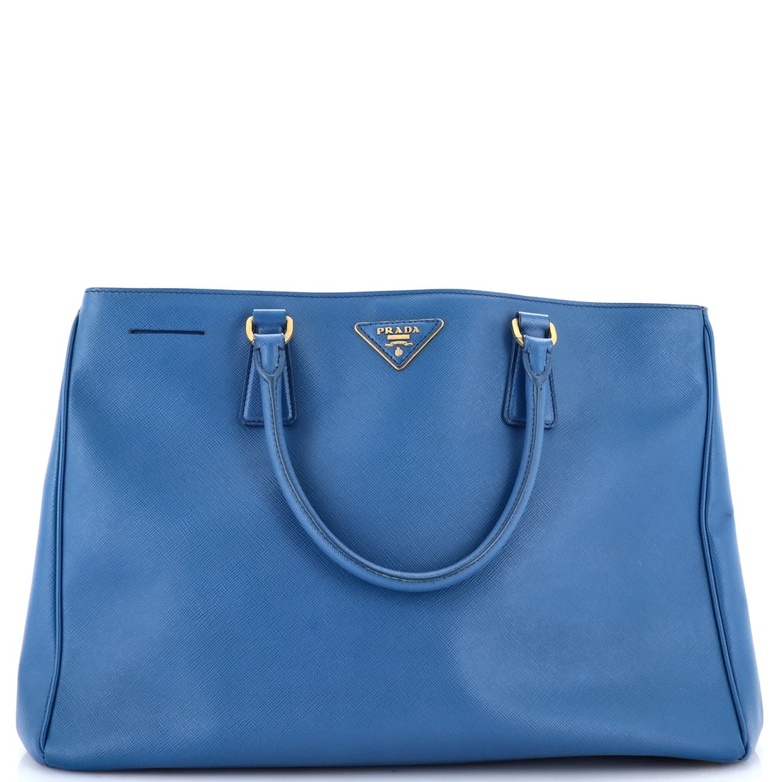 Lux open tote saffiano leather large: Lux open tote saffiano leather large Heavy cracking throughout, corner wear, edge wear, scuffs, and minor creases characterize this large Lux Open Tote Saffiano Leather bag from Prada. The exterior