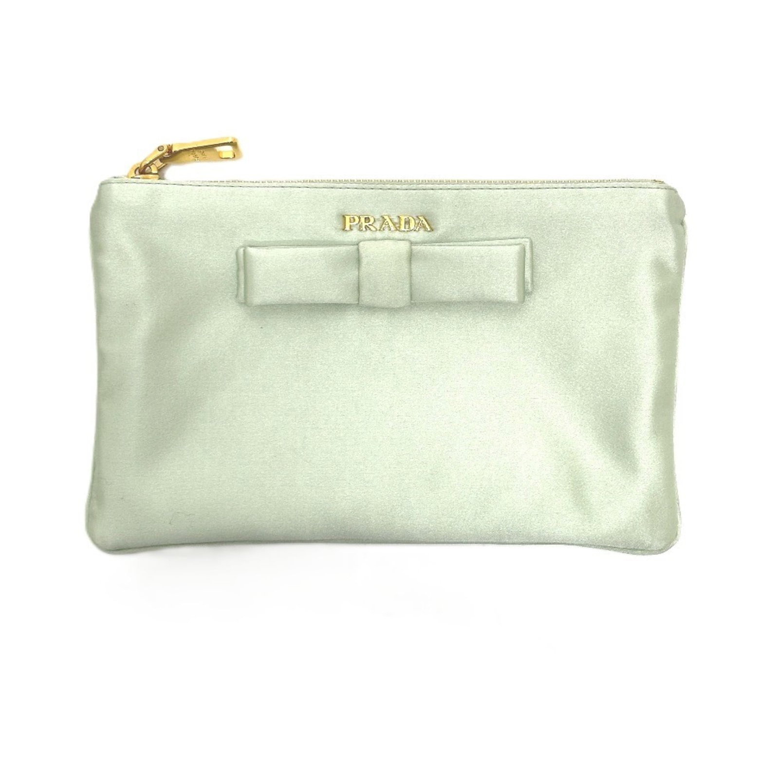 Satin clutch bag by Prada: Satin clutch bag by Prada Satin clutch bag by Prada, crafted from luxurious green satin. This elegant accessory measures 12cm x 19cm and comes with a box and guarantee card. A beautiful addition to