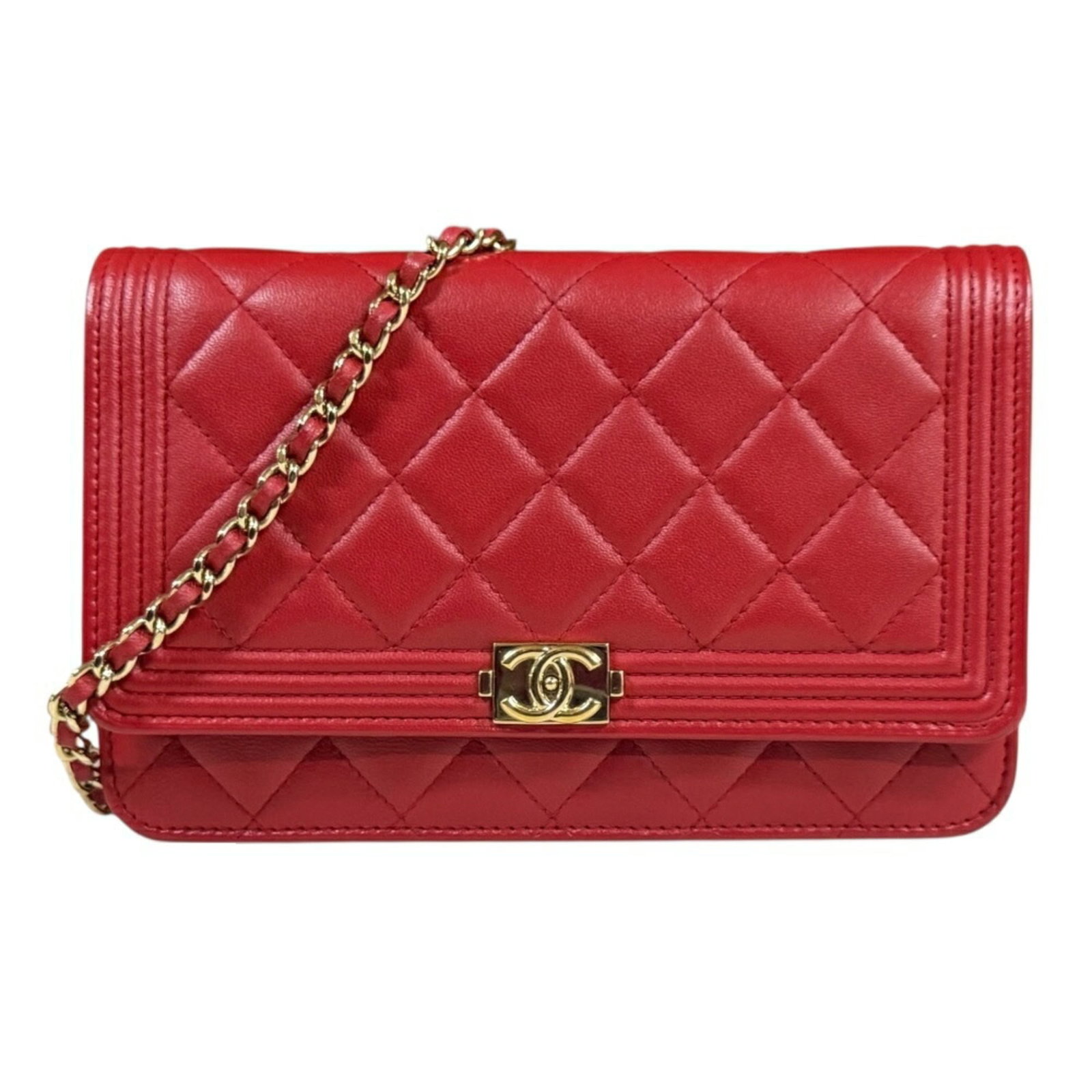 Shoulder Bag Leather Chanel: Shoulder Bag Leather Chanel Red leather shoulder bag from the Boy Chanel line, featuring snap fasteners and multiple pockets for organization. The bag boasts a classic design with a zipper pocket,
