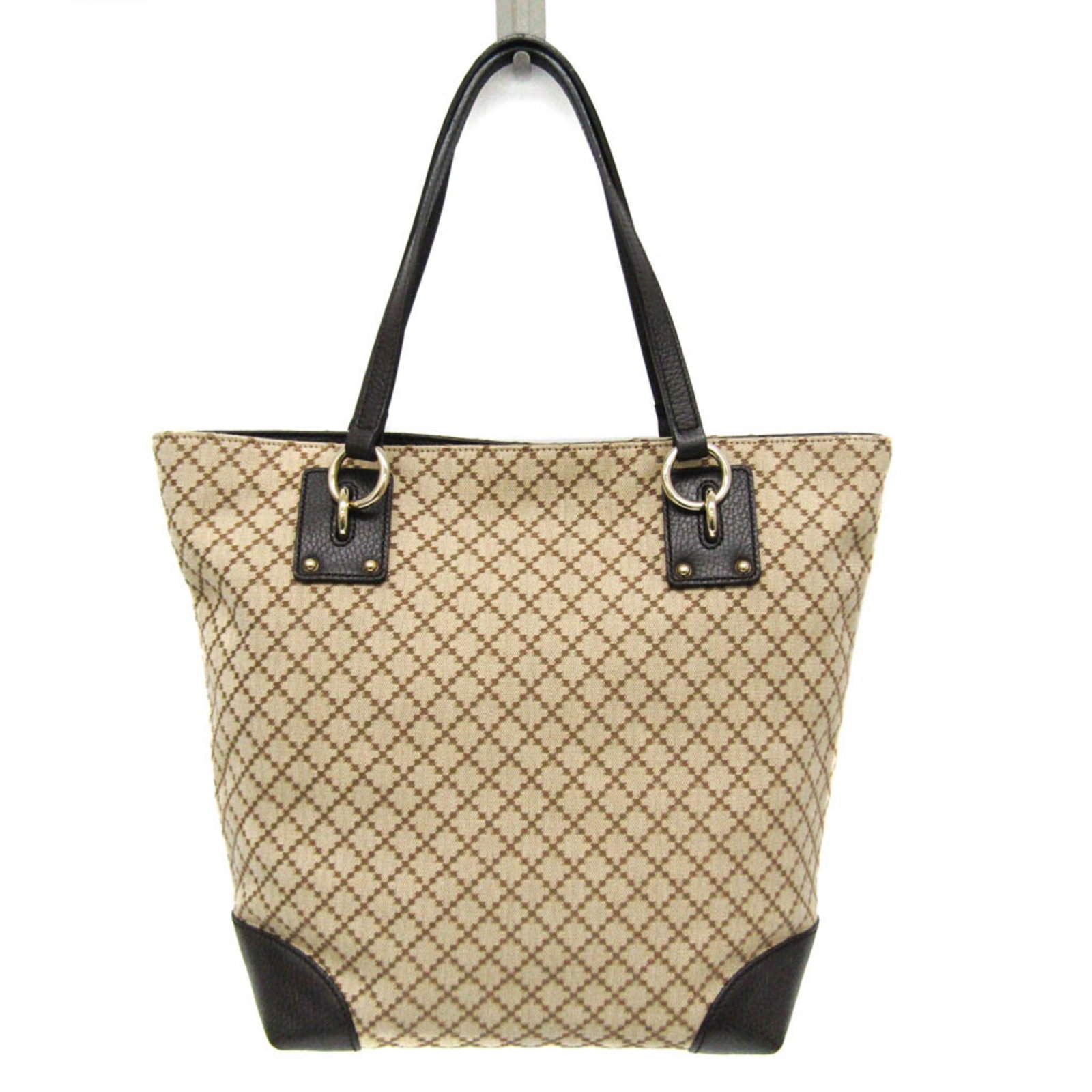 Canvas leather tote bag by Gucci: Canvas leather tote bag by Gucci Canvas leather tote bag by Gucci, featuring a base width of 25cm and made from high-quality canvas and leather materials. This stylish tote measures 30cm x 37cm x 12.5