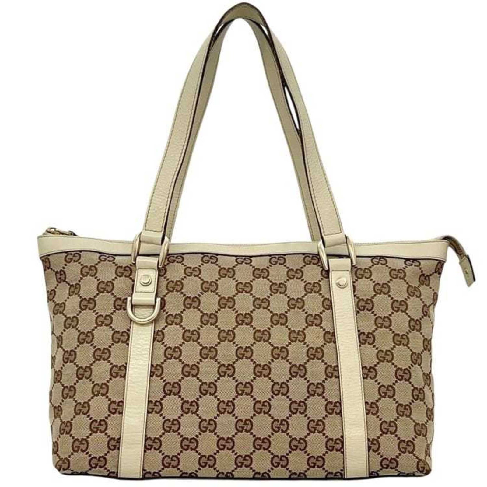 Canvas leather tote bag by Gucci: Canvas leather tote bag by Gucci Canvas leather tote bag by Gucci, featuring high-quality canvas and rich leather construction in a classic beige color. With its spacious interior and sturdy design, t