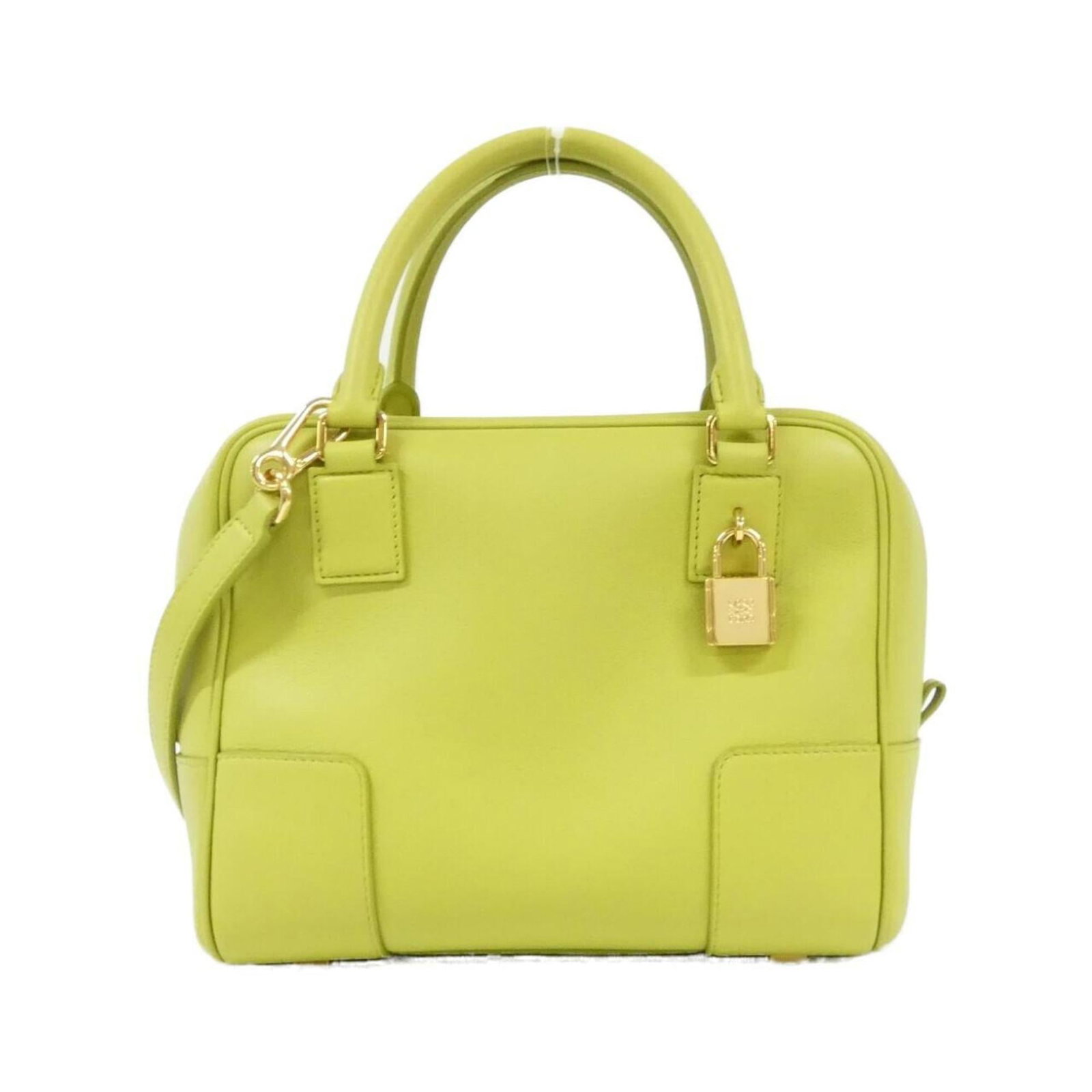 Loewe Handbag Leather: Loewe Handbag Leather Loewe Handbag Leather features a vibrant lime yellow color and gold hardware, adding a touch of elegance to its classic design. Made from high-quality calfskin leather, this hand